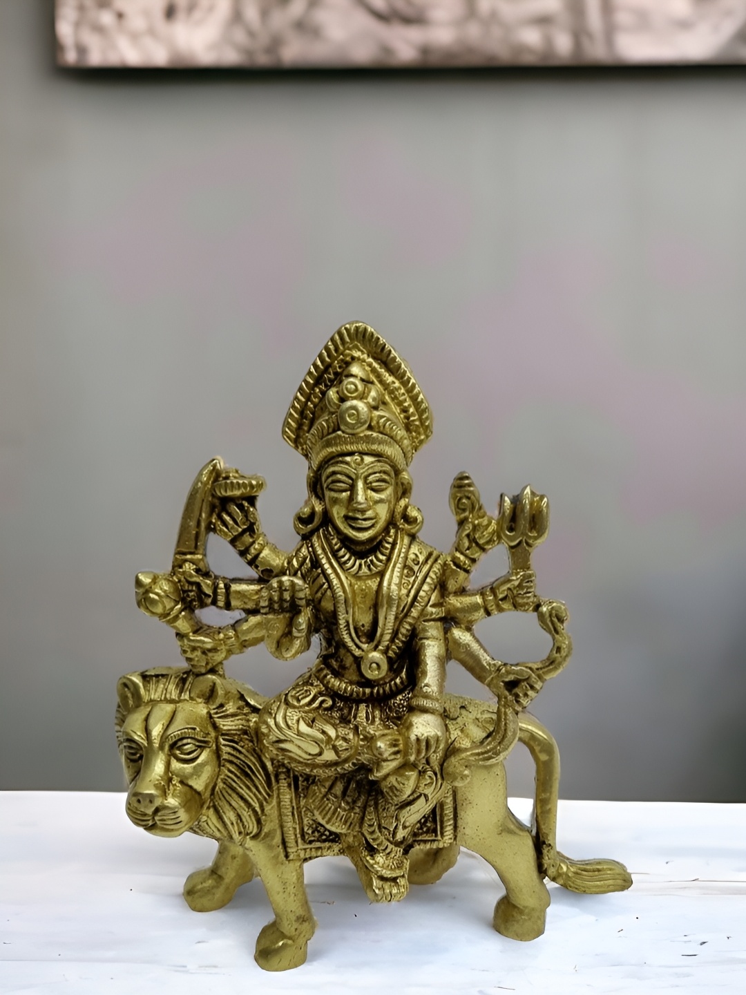 

Aakrati Yellow Religious Idol Showpiece