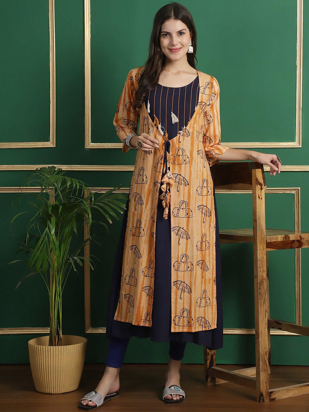 

Grancy Ethnic Motifs Printed Cotton Longline Tie-Up Shrug, Mustard
