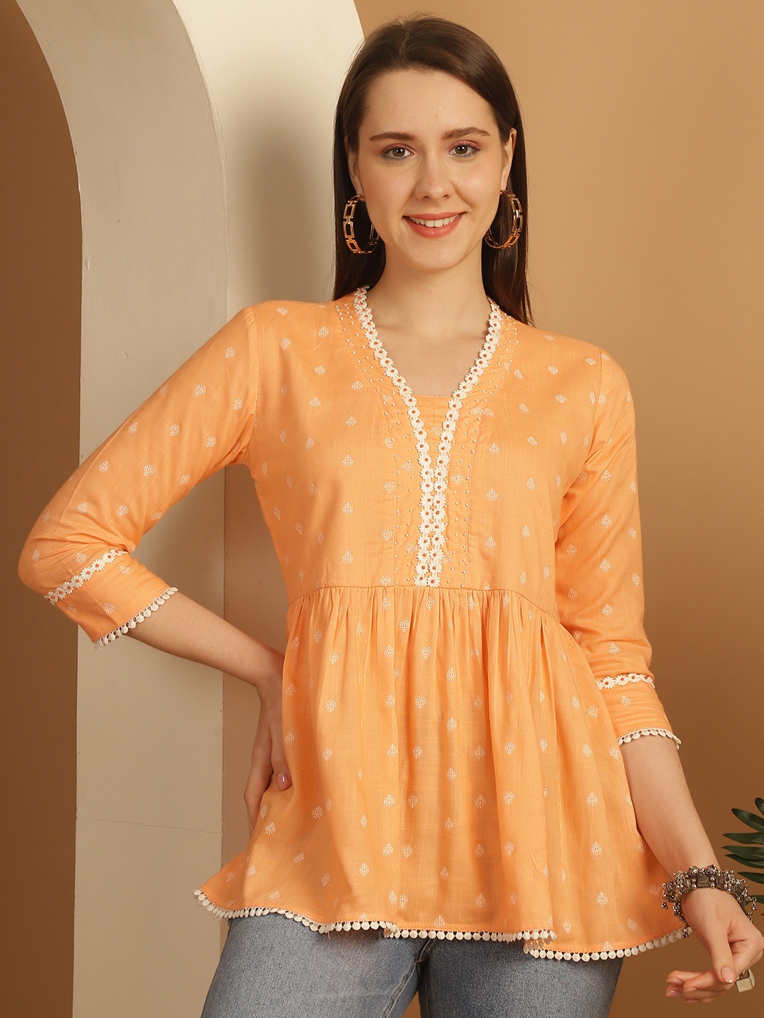 

KALINI Floral Printed Embellished Cotton Peplum Top, Peach