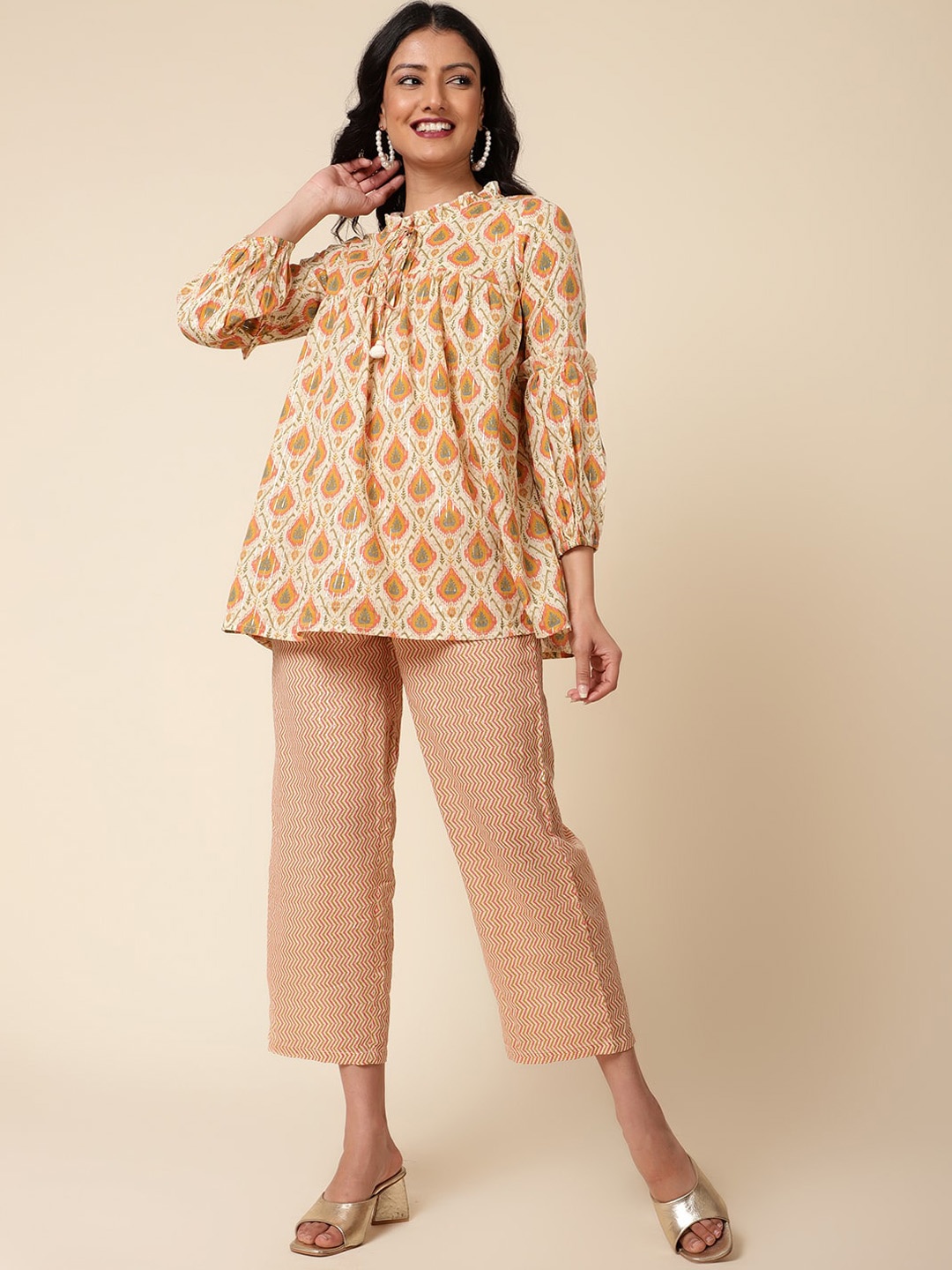 

Bani Women Ethinic Motifs Printed Tie-Up Neck Tunic With Trousers Co-Ords, Orange