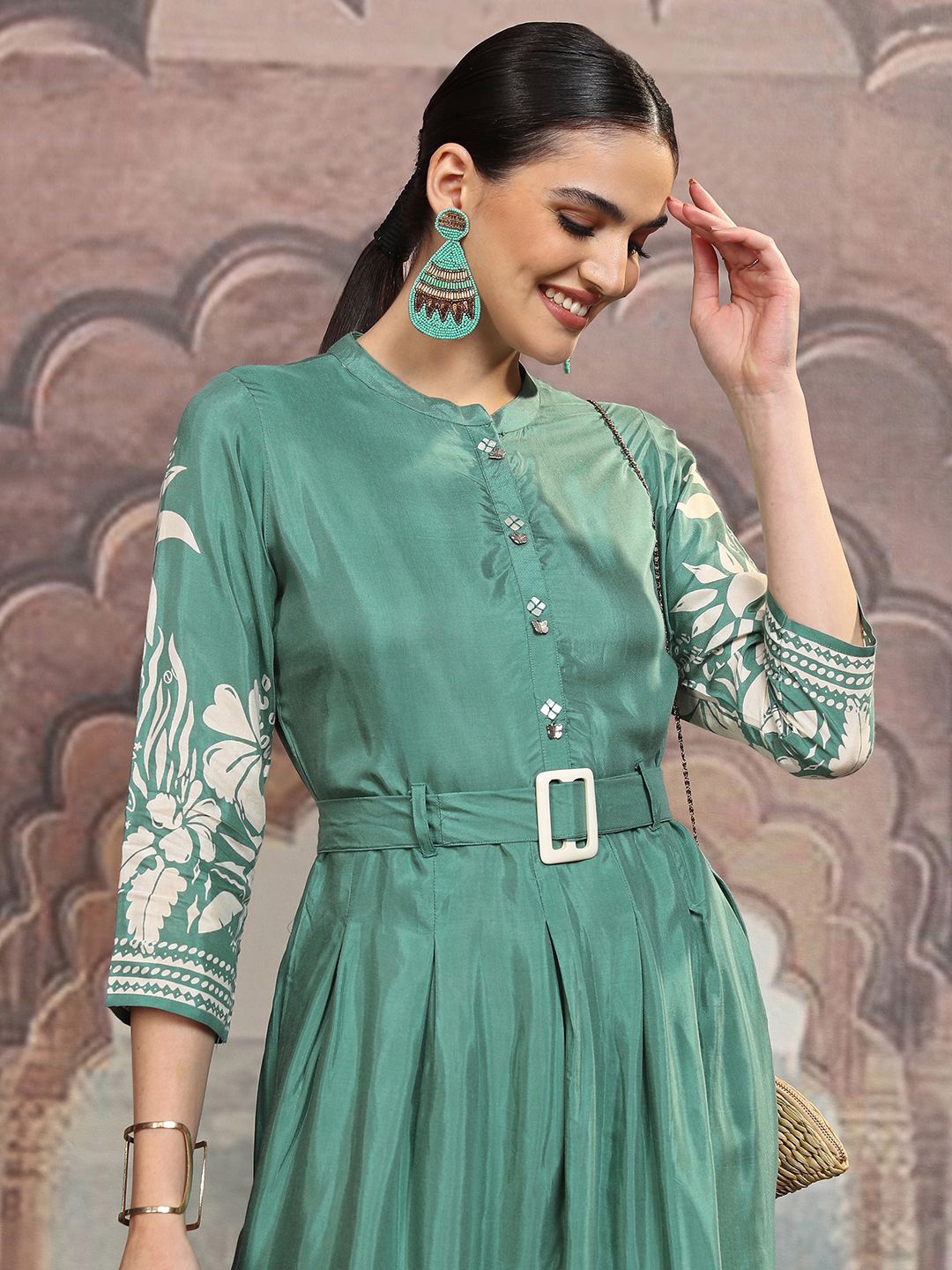 

Vishudh Teal Green Floral Printed Mandarin Collar Pleated A-Line Midi Dress