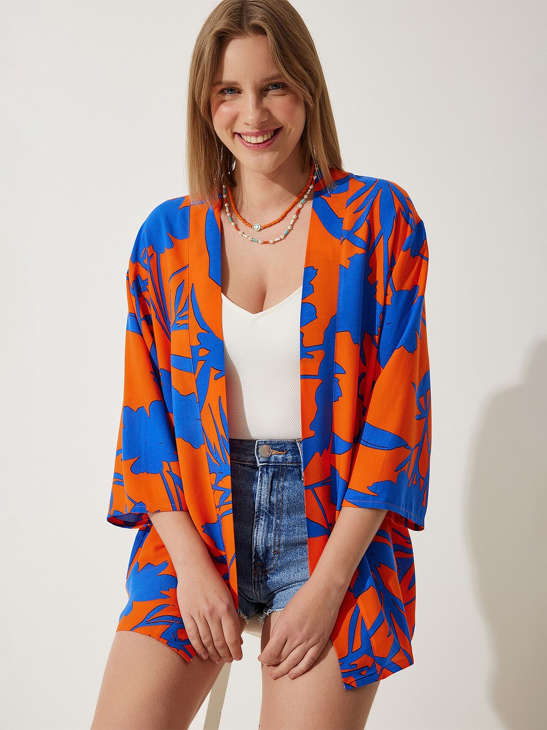 

Happiness istanbul Abstract Printed Open Front Shrug, Blue