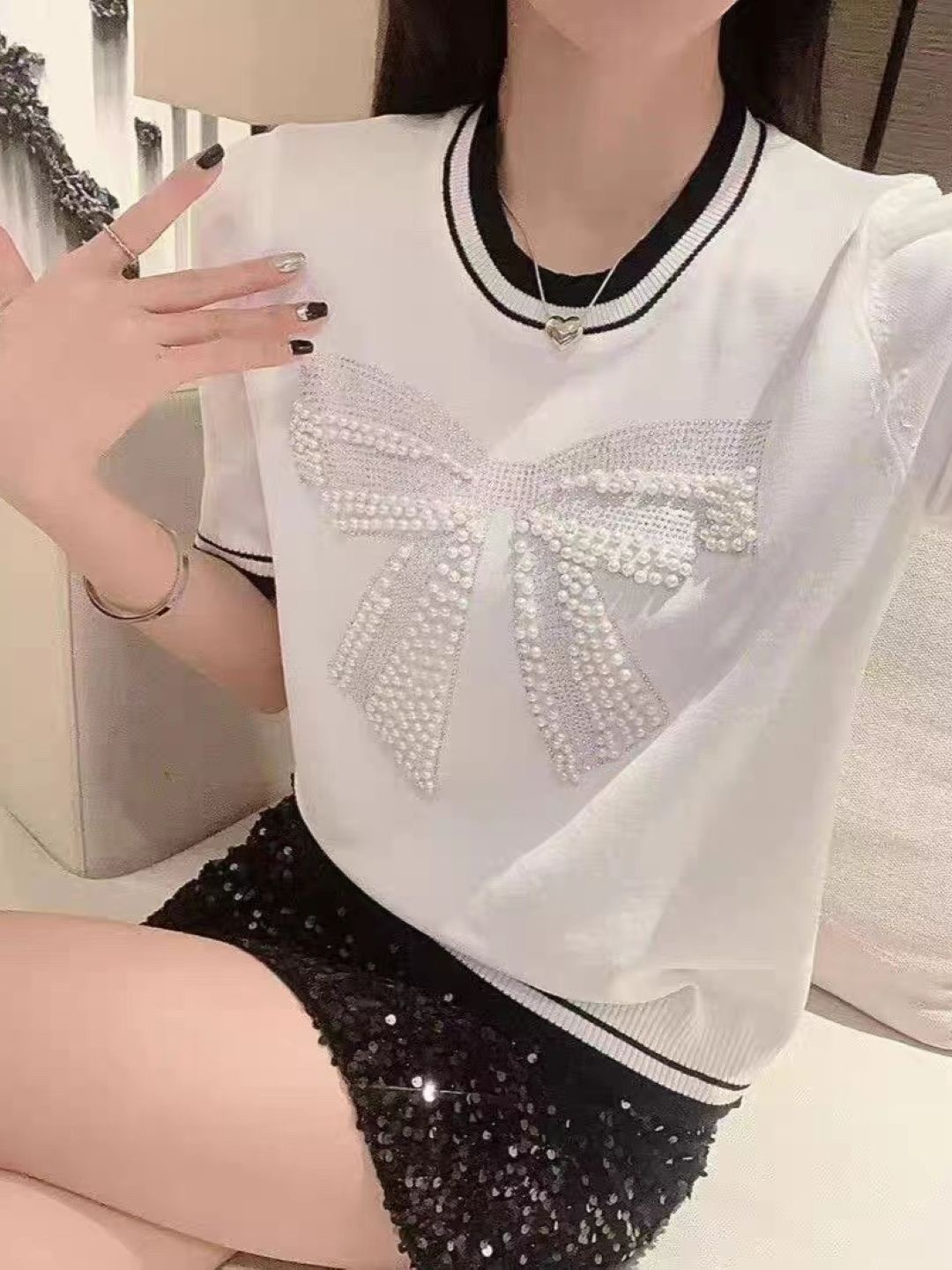 

StyleCast White Embellished Round Neck Top