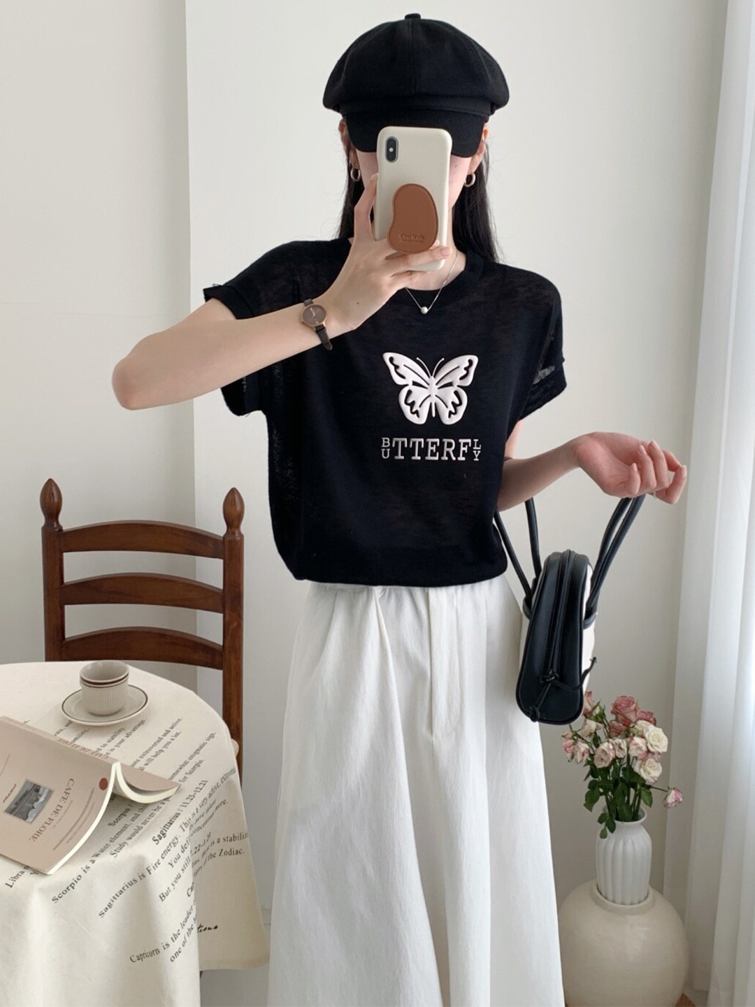 

StyleCast Black Typography Printed Round Neck Top