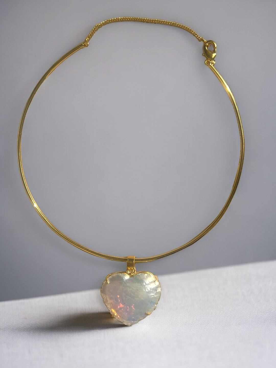 

XAGO Gold-Plated American Diamond Studded Heart Shaped Pendant With Chain