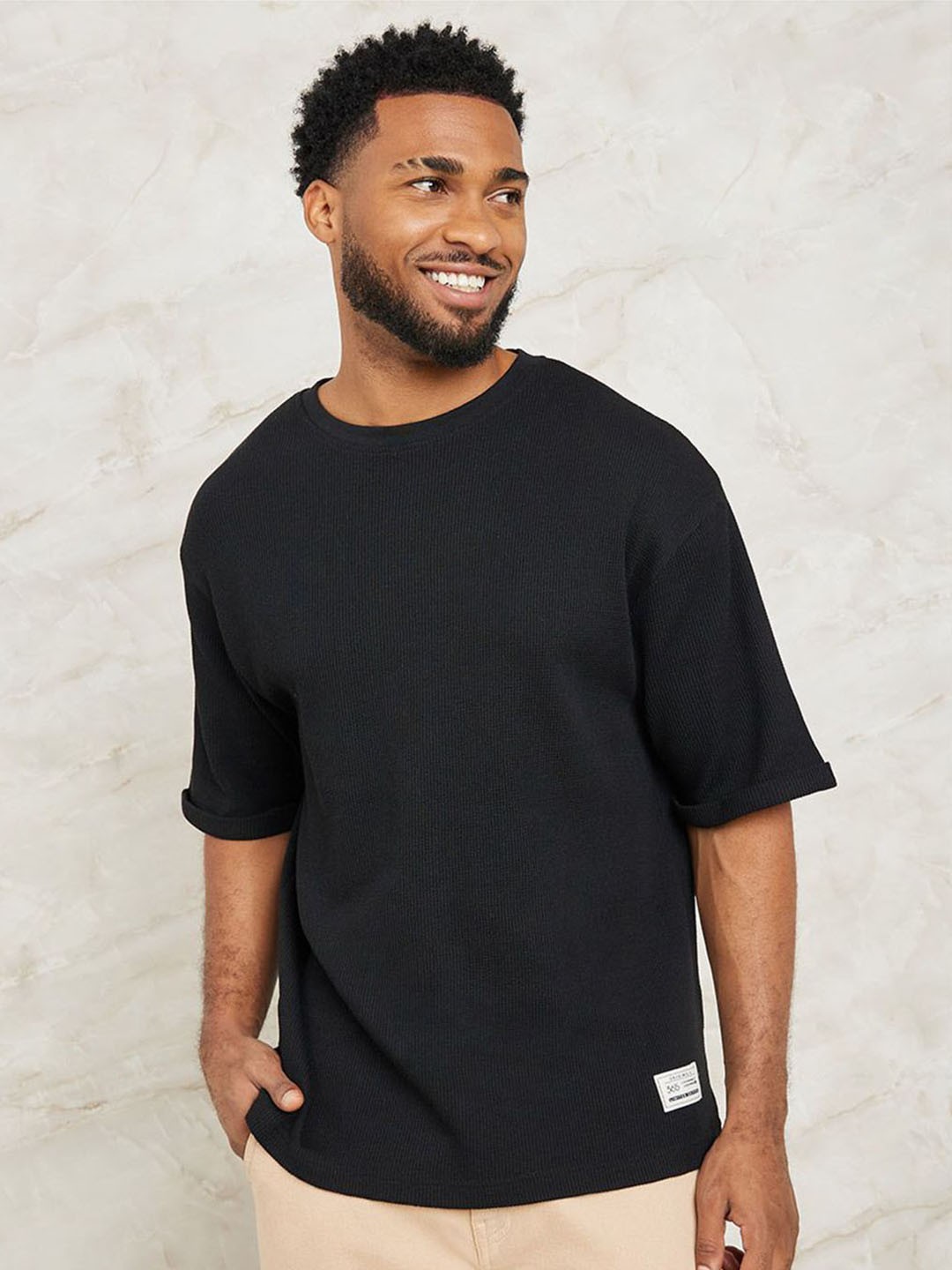 

Styli Round Neck Drop Shoulder Sleeves Oversized Cotton T-shirt, Black