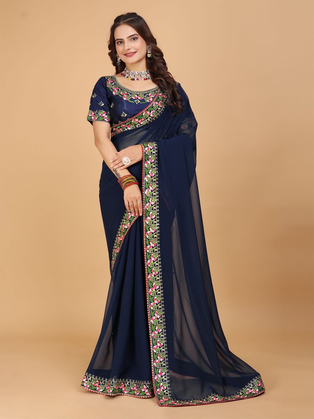 

DRIZOMIZ Embroidered Pure Georgette Heavy Work Ikat Saree, Blue