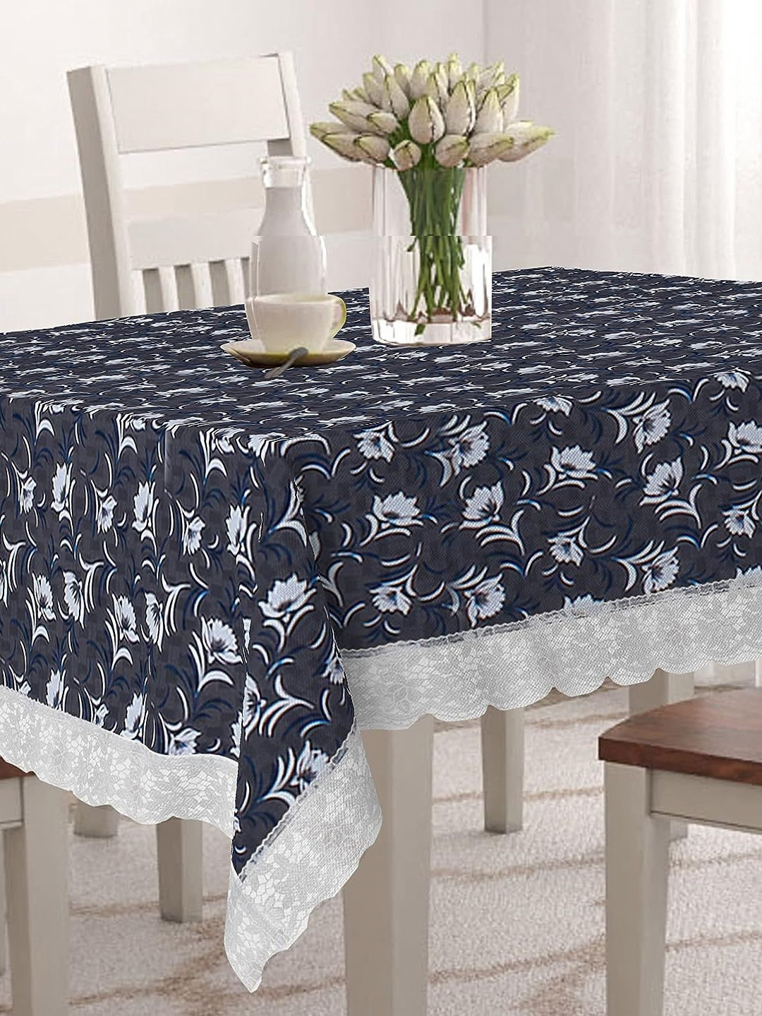 

Aura Black & White Floral 5 Seater Rectangle Table Cover
