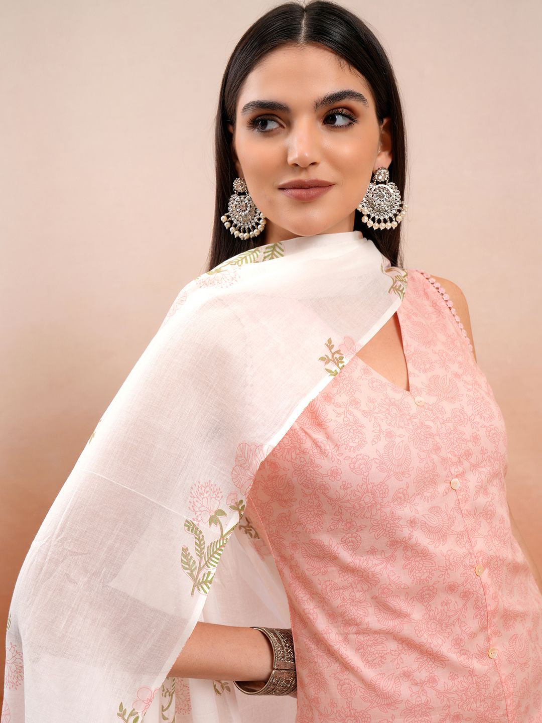 

Vishudh Pink Floral Printed Sleeveless Pure Cotton Straight Kurta With Trousers & Dupatta