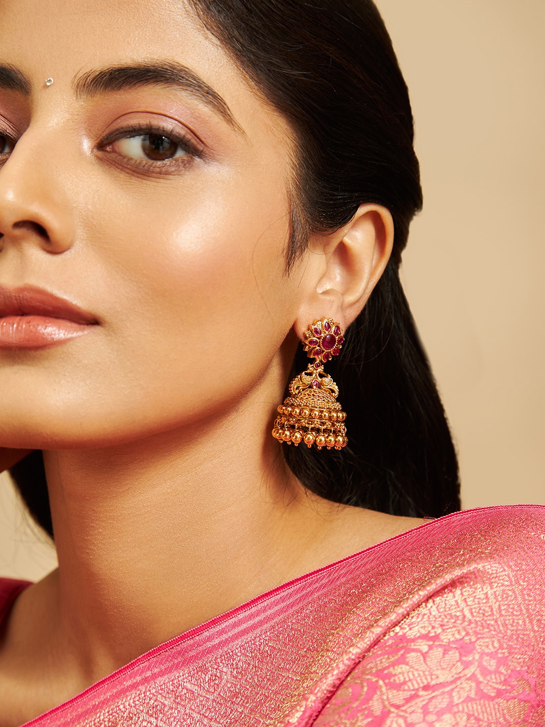 

Kushal's Fashion Jewellery Gold-Plated Stone-Studded Dome Shaped Antique Jhumkas