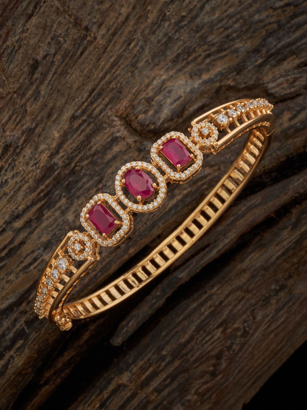

Kushal's Fashion Jewellery Women Cubic Zirconia Gold-Plated Kada Bracelet
