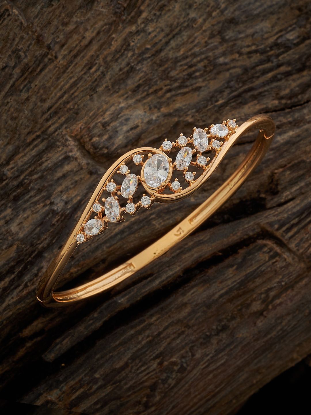 

Kushal's Fashion Jewellery Women Cubic Zirconia Gold-Plated Kada Bracelet