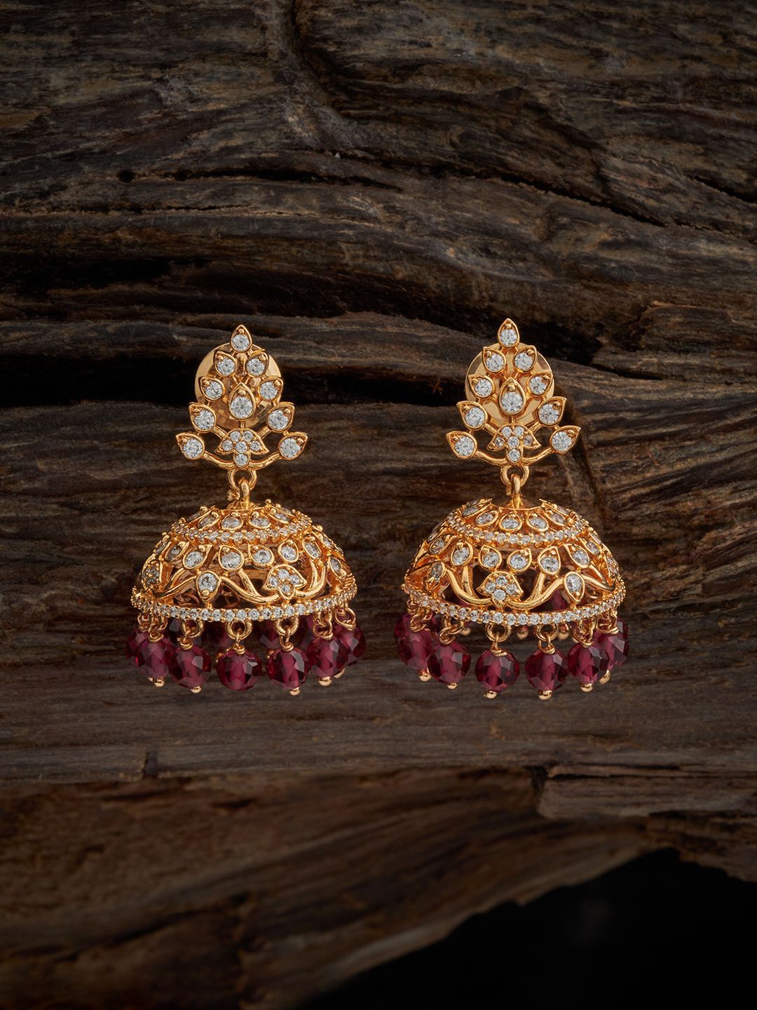 

Kushal's Fashion Jewellery Gold-Plated Zircon-Studded & Beaded Dome Shaped Antique Jhumkas