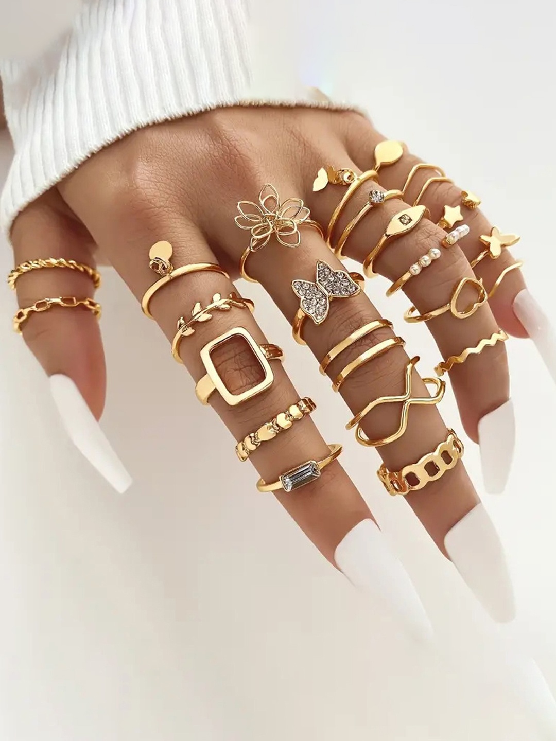 

Jewels Galaxy Set Of 23 Gold Plated Stone Studded & Beaded Finger Ring