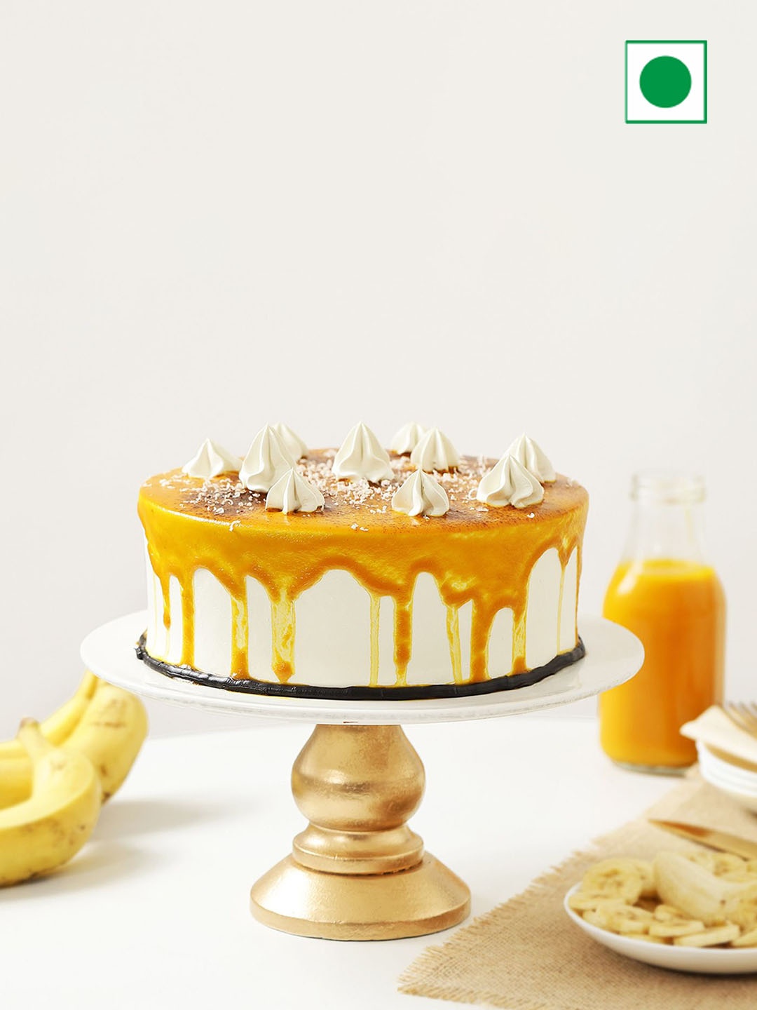 

IGP Butterscotch Flavour Eggless Round Heavenly Drip Cake-500 g, White