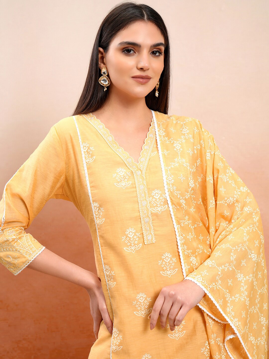 

Vishudh Orange Floral Printed V-Neck Pure Cotton Straight Kurta With Trousers & Dupatta