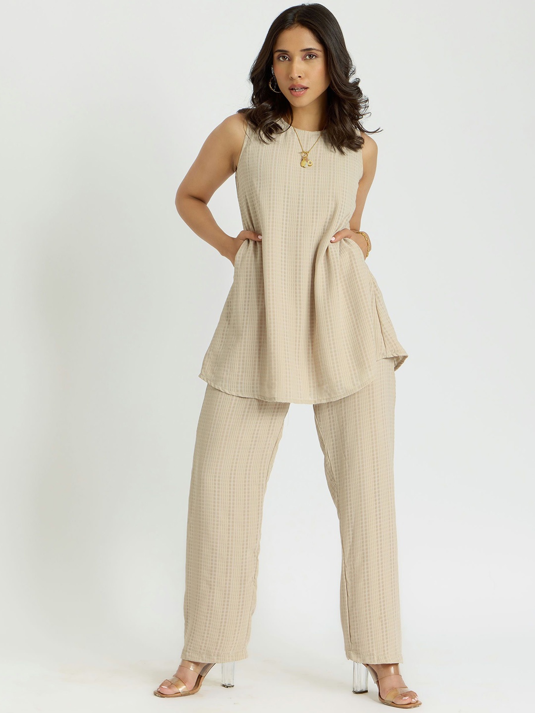 

Alaya By Stage3 Cairo French Vanilla Self Design Round Neck Sleveless Tunic & Trousers, Off white