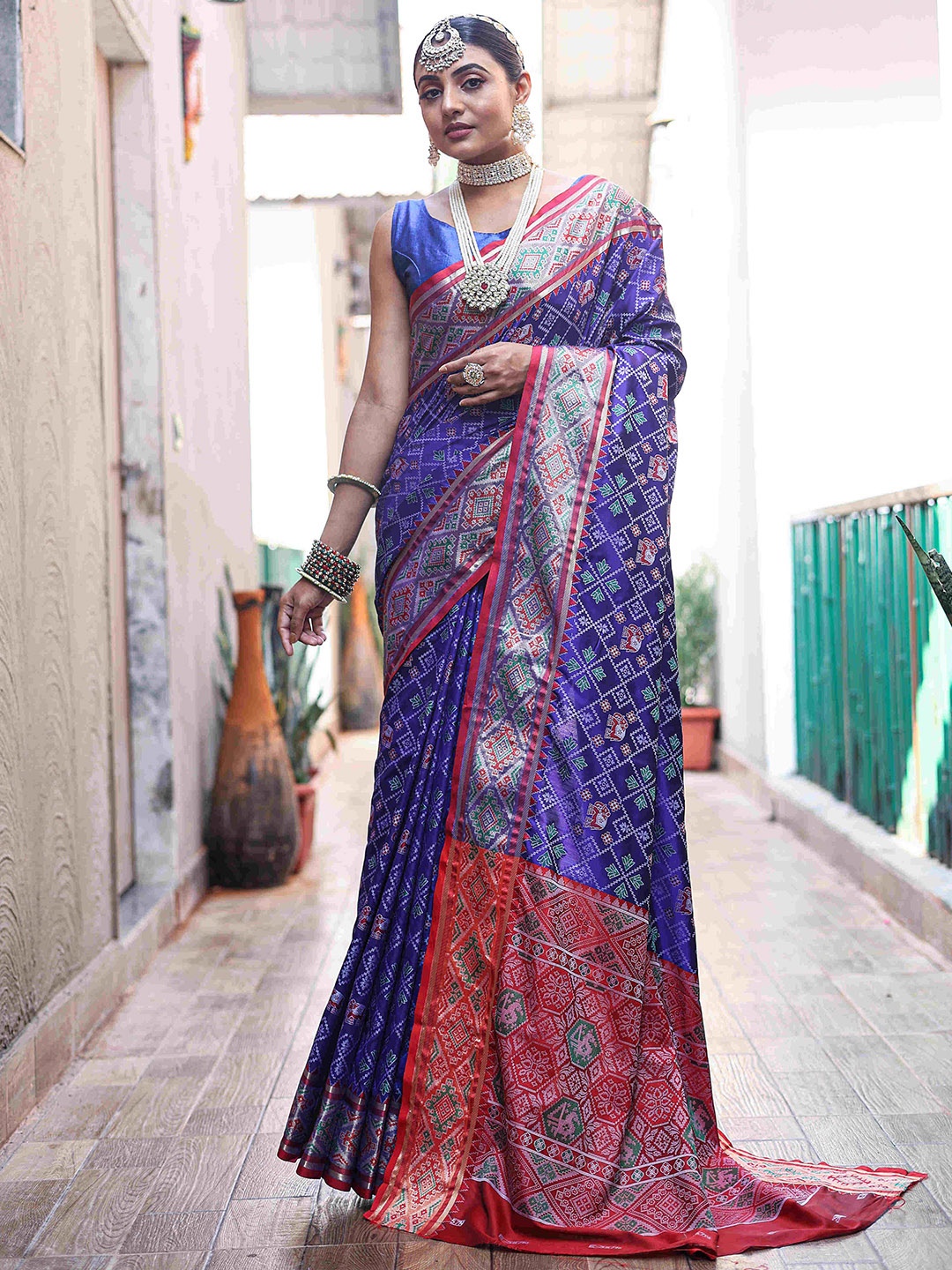 

DEVATITHI Woven Design Zari Patola Saree, Blue