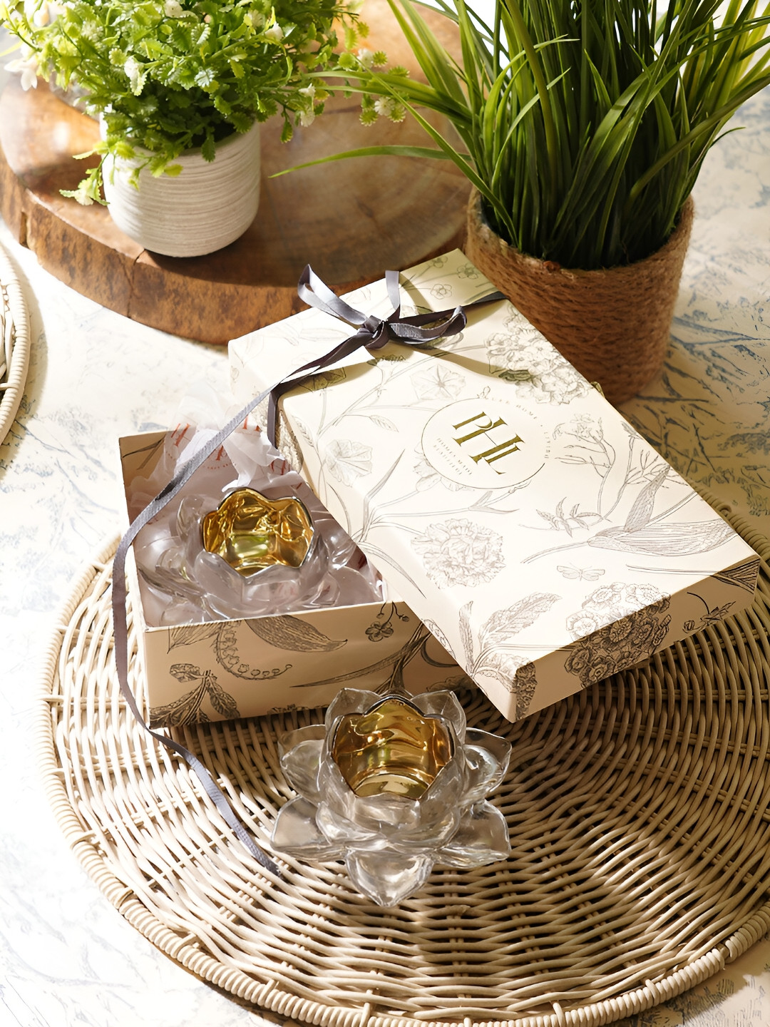 

Pure Home and Living Transparent & Gold toned 2 Pieces Glass Candle Holder