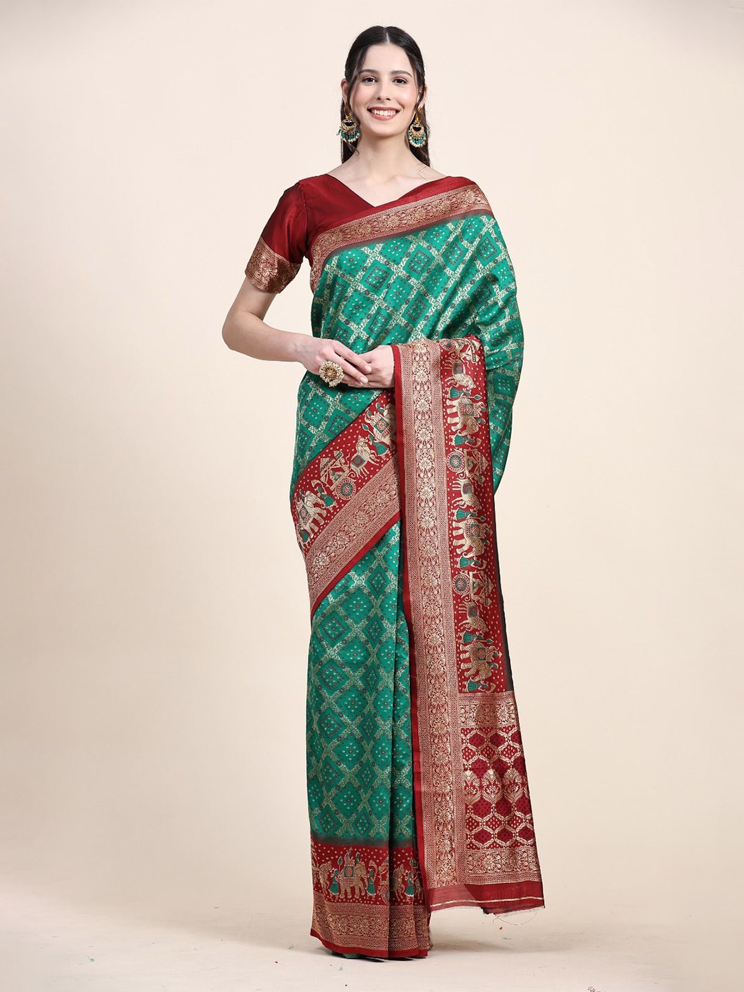

Mitera Woven Design Zari Patola Saree, Olive