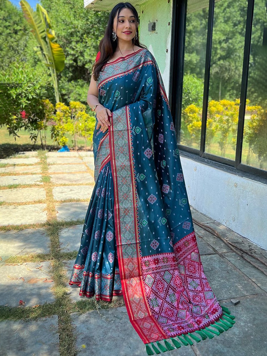 

Mitera Floral Zari Patola Saree, Navy blue