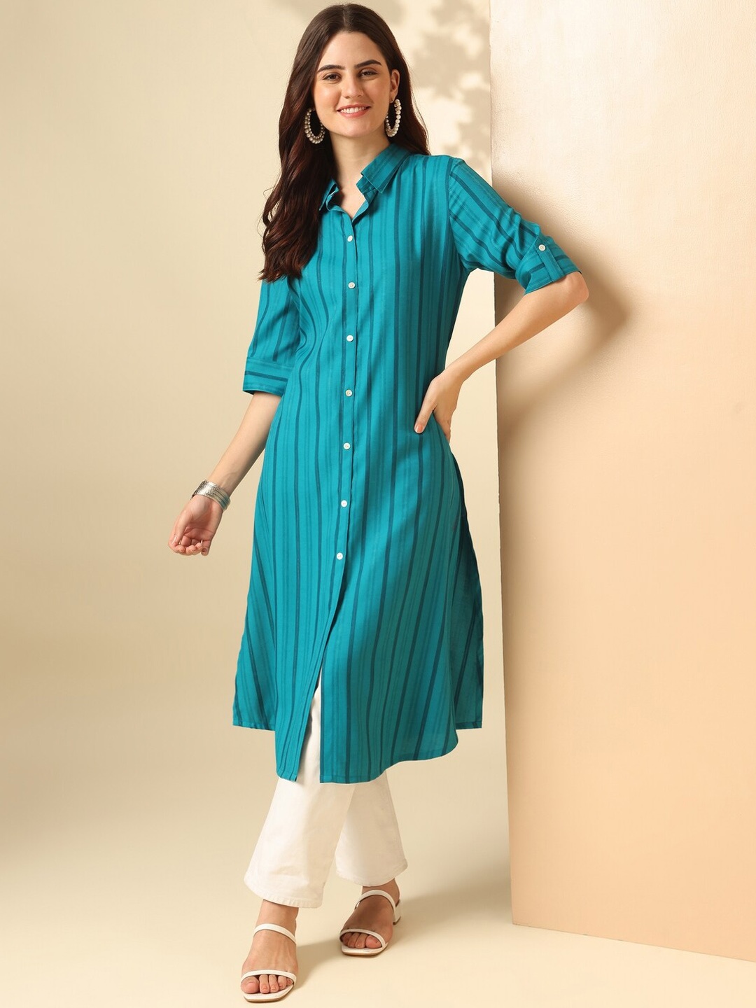 

Anouk Turquoise Blue Striped Self Design Shirt Collar Regular A-Line Kurta