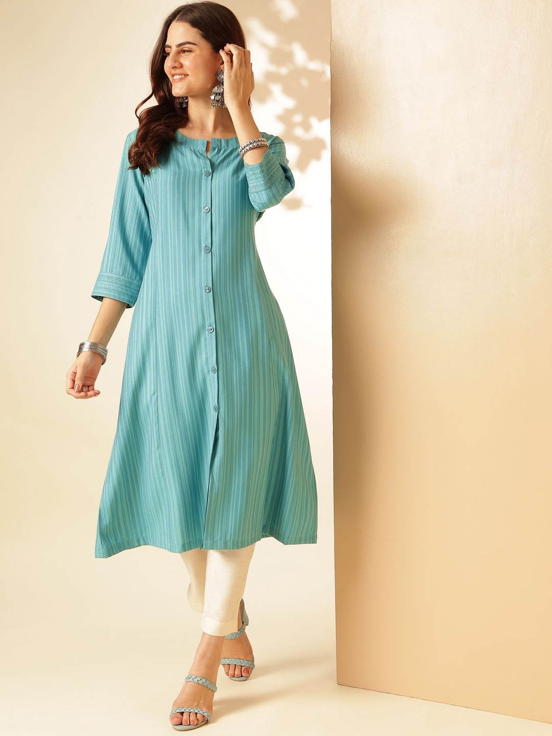 

Anouk Turquoise Blue Striped Self Design Round Neck Regular Anarkali Kurta