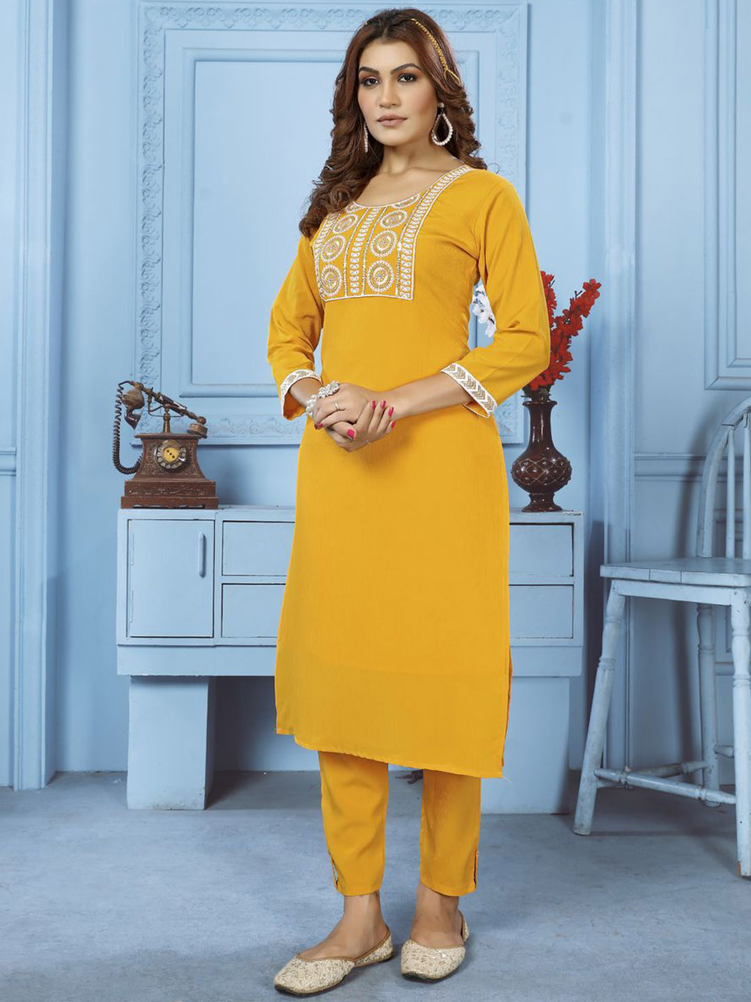 

Rujave Ethnic Motifs Embroidered Regular Thread Work Straight Kurta & Trousers, Yellow