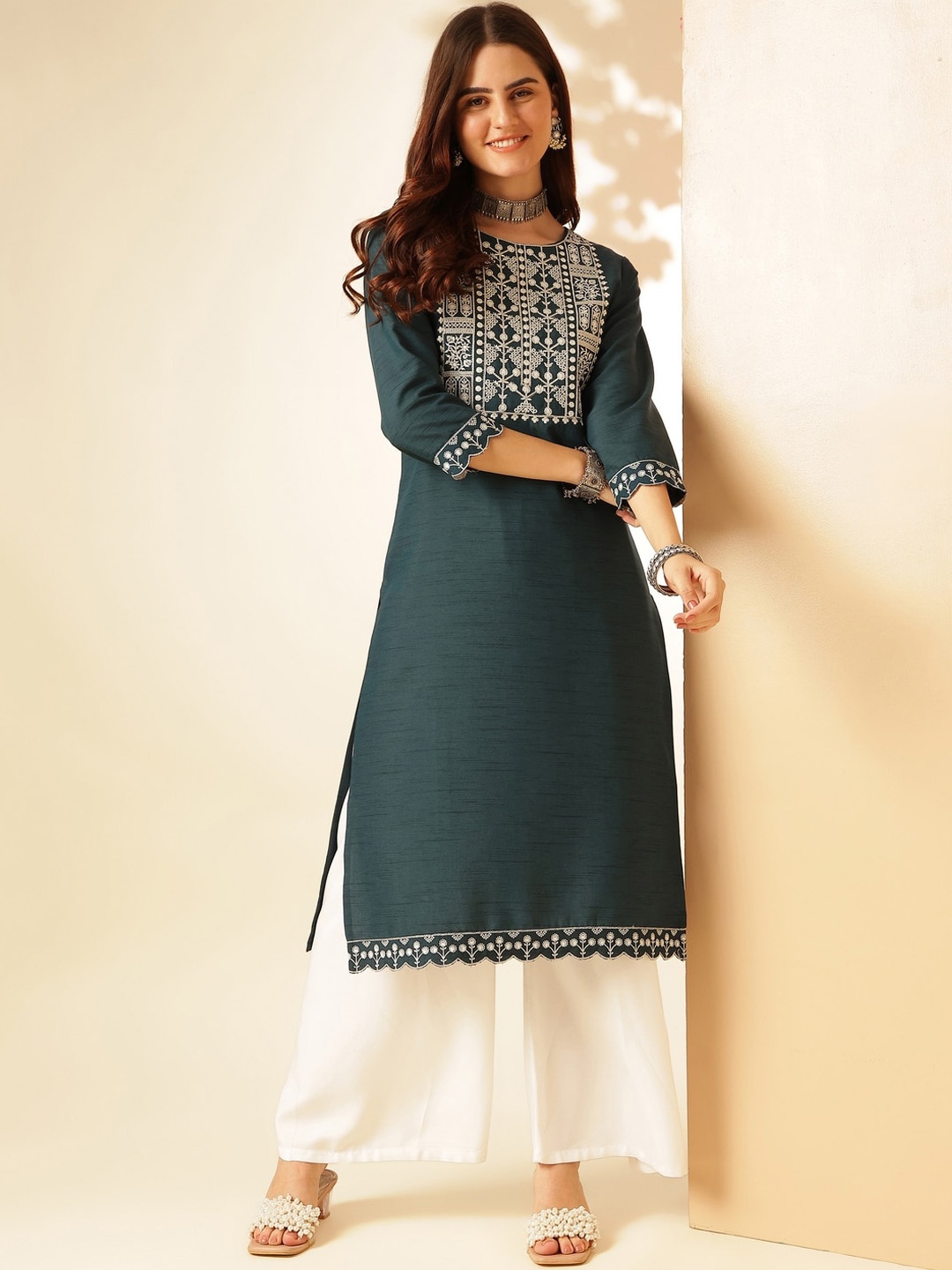 

Anouk Teal Green Geometric Yoke Design Flared Sleeves Thread Work Dobby Straight Kurta