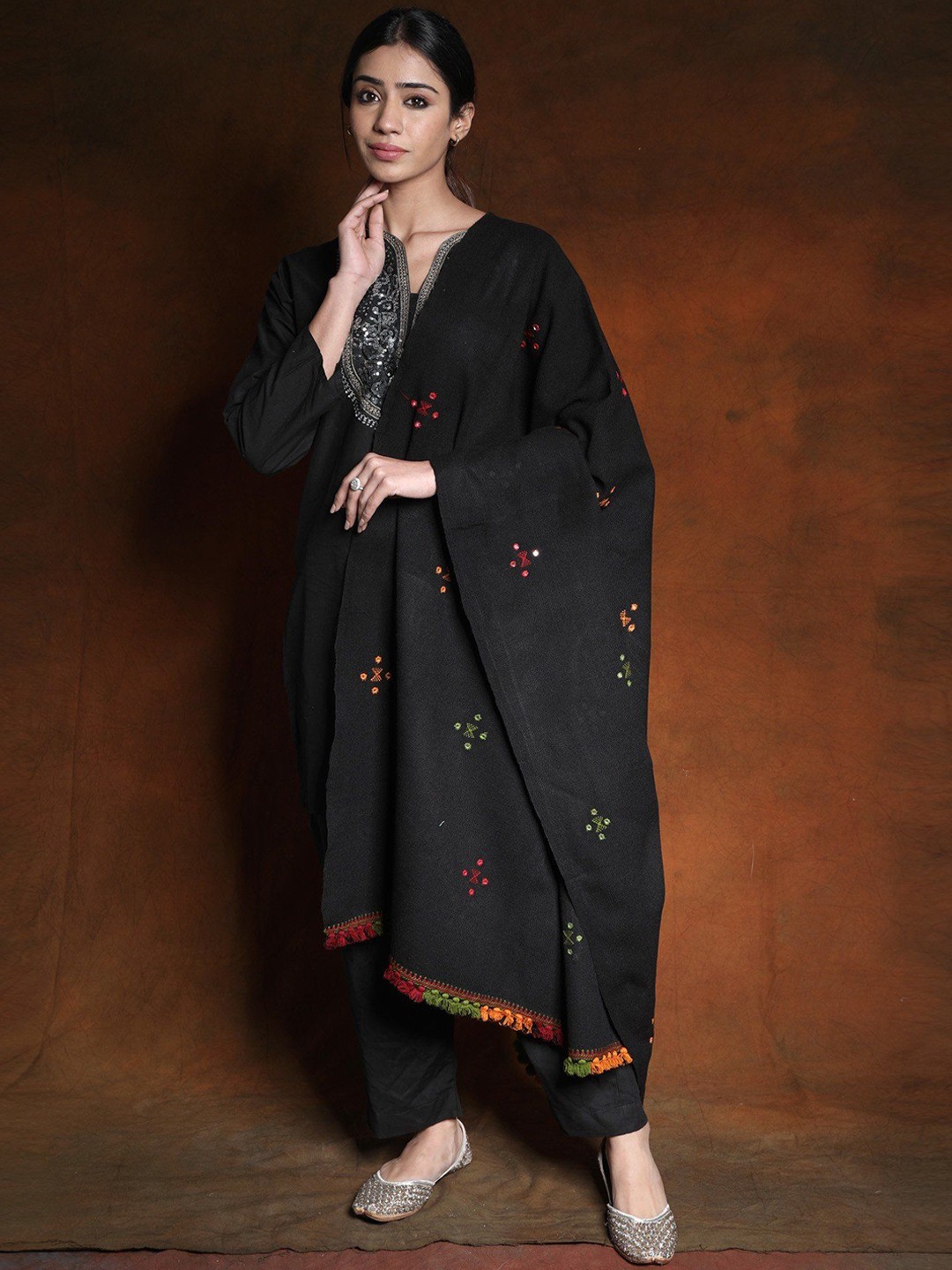 

Exotic India Black Onyx Woolen Plain Shawl with Mirror Embroidery