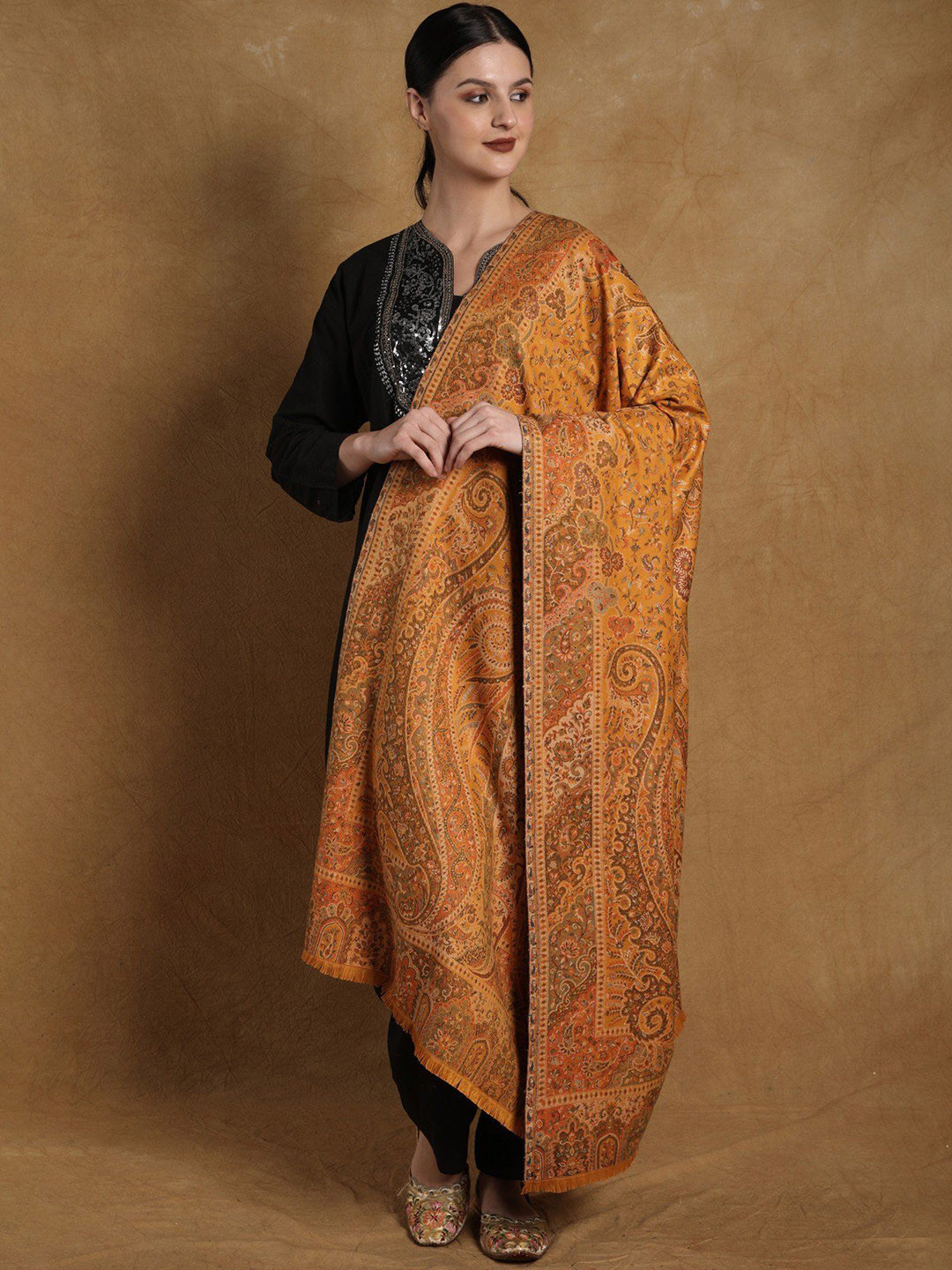 

Exotic India Golden Orange Kani Jamawar Wool Shawl with Woven Multicolor Flowers