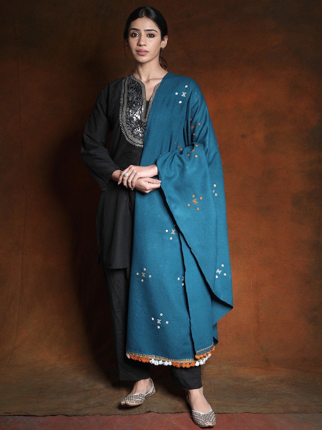 

Exotic India Blue Sapphire Woolen Plain Shawl with Mirror Embroidery