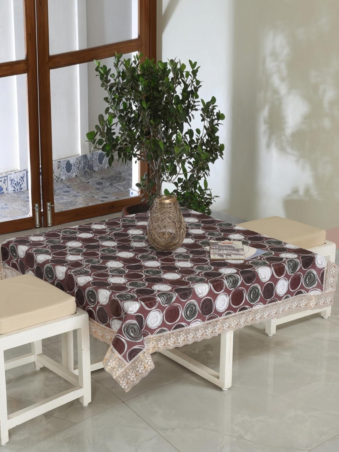 

Homerz Brown & White Geometric Printed 4-Seater Table Cover