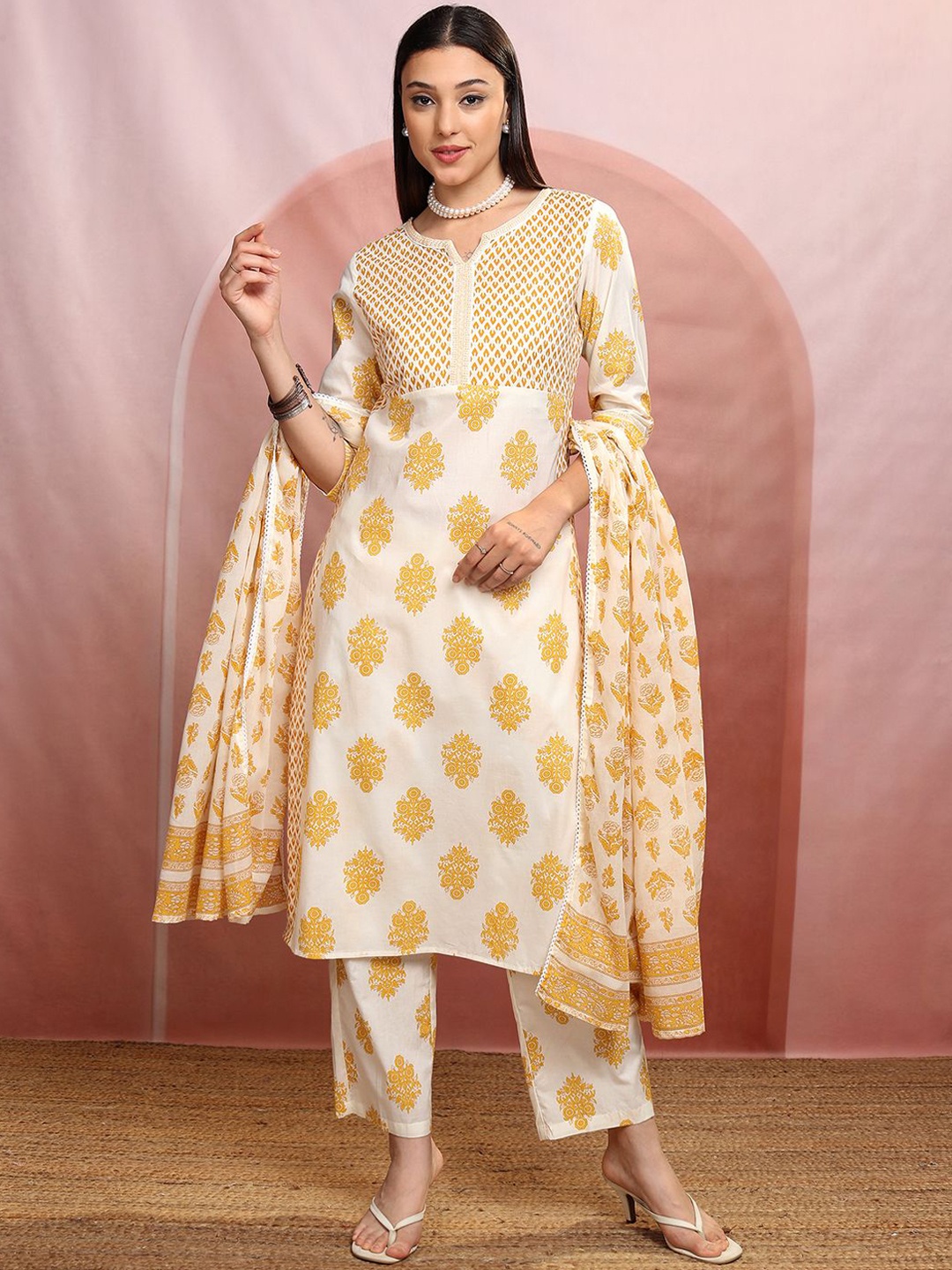 

Vishudh Cream Notch Neck Printed Regular Pure Cotton Straight Kurta Set