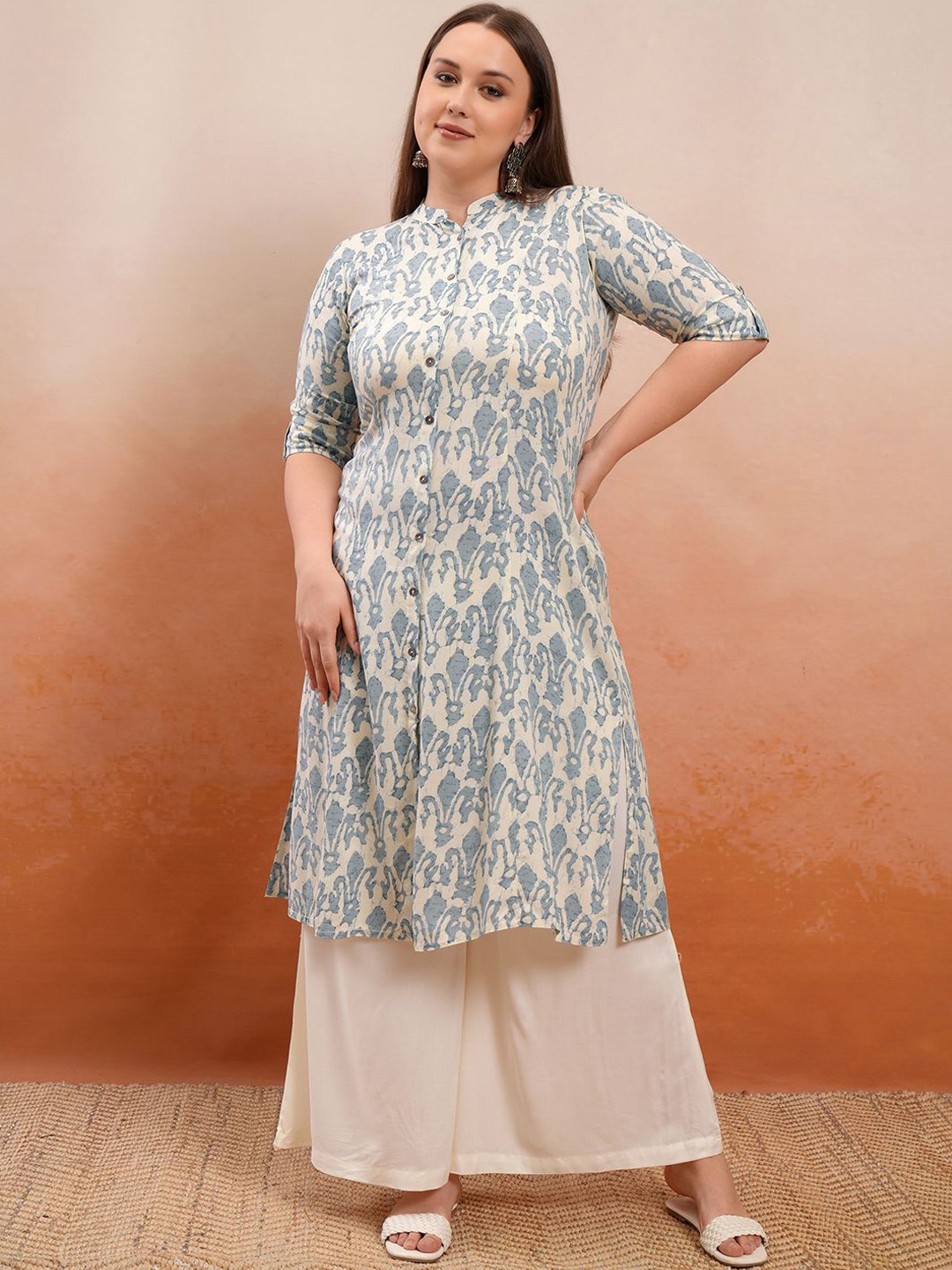 

Vishudh Beige Printed Ethnic Motifs Printed Mandarin Collar Roll-Up Sleeves A-Line Kurta
