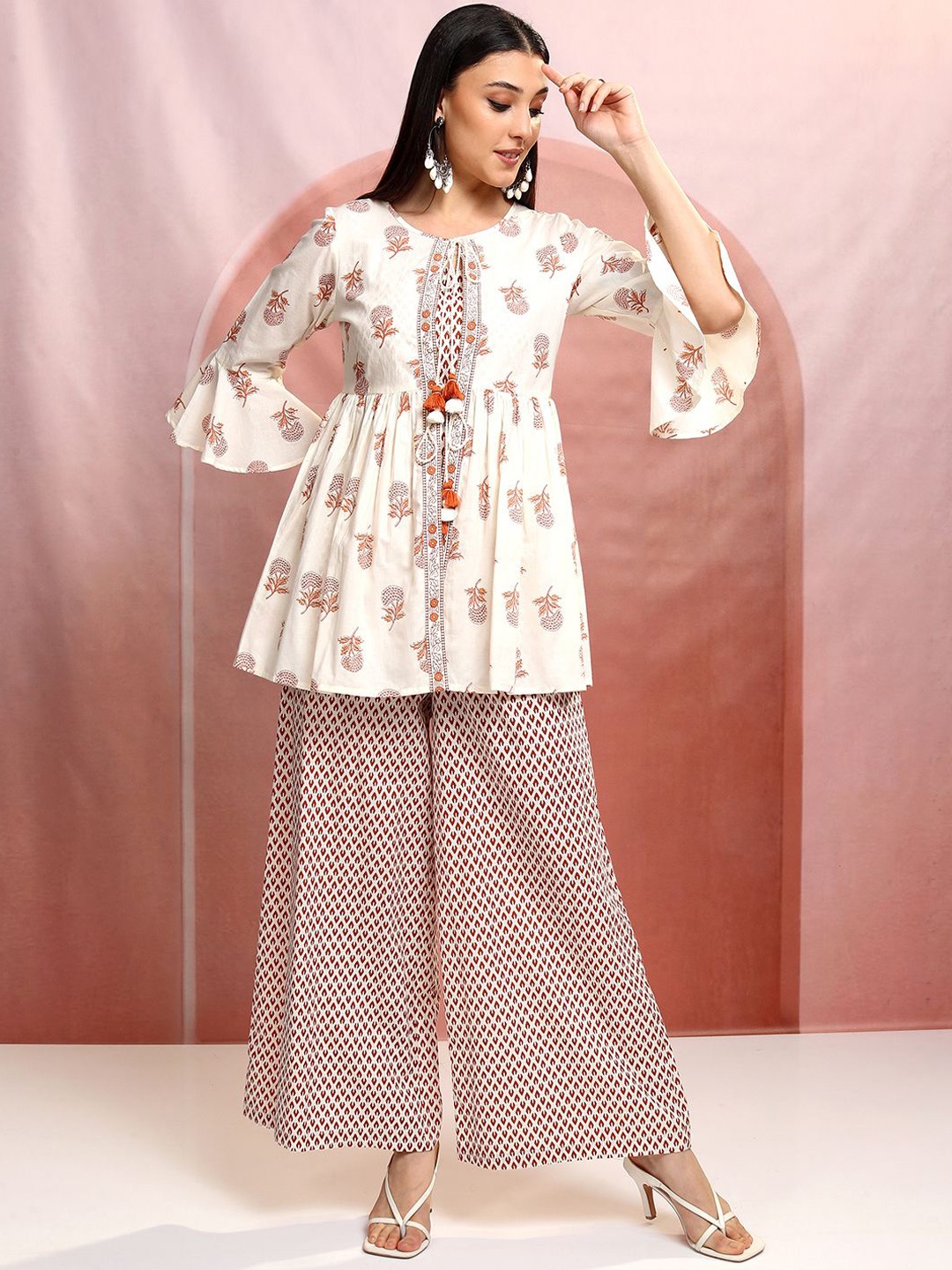 

Vishudh Cream-Coloured Floral Printed Tie-Up Neck Pure Cotton Tunic With Palazzos & Jacket