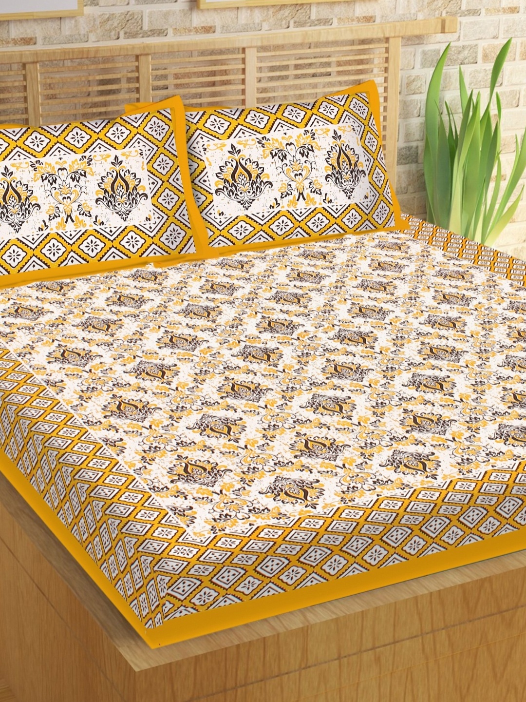 

Aura Yellow & White Ethnic Motifs 144 TC Queen Bedsheet With 2 Pillow Covers