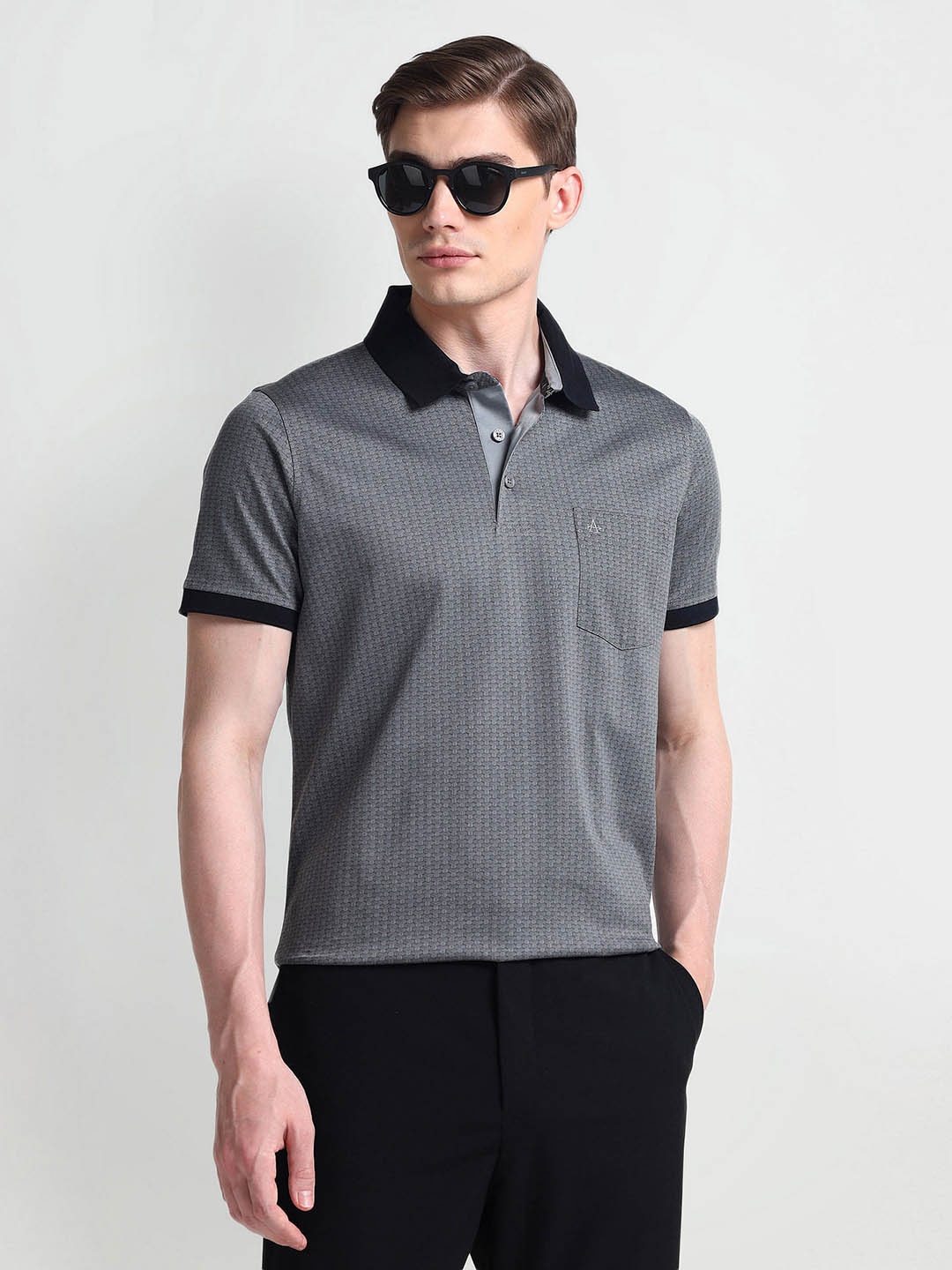 

Arrow Men Polo Collar Solid T-shirt, Grey