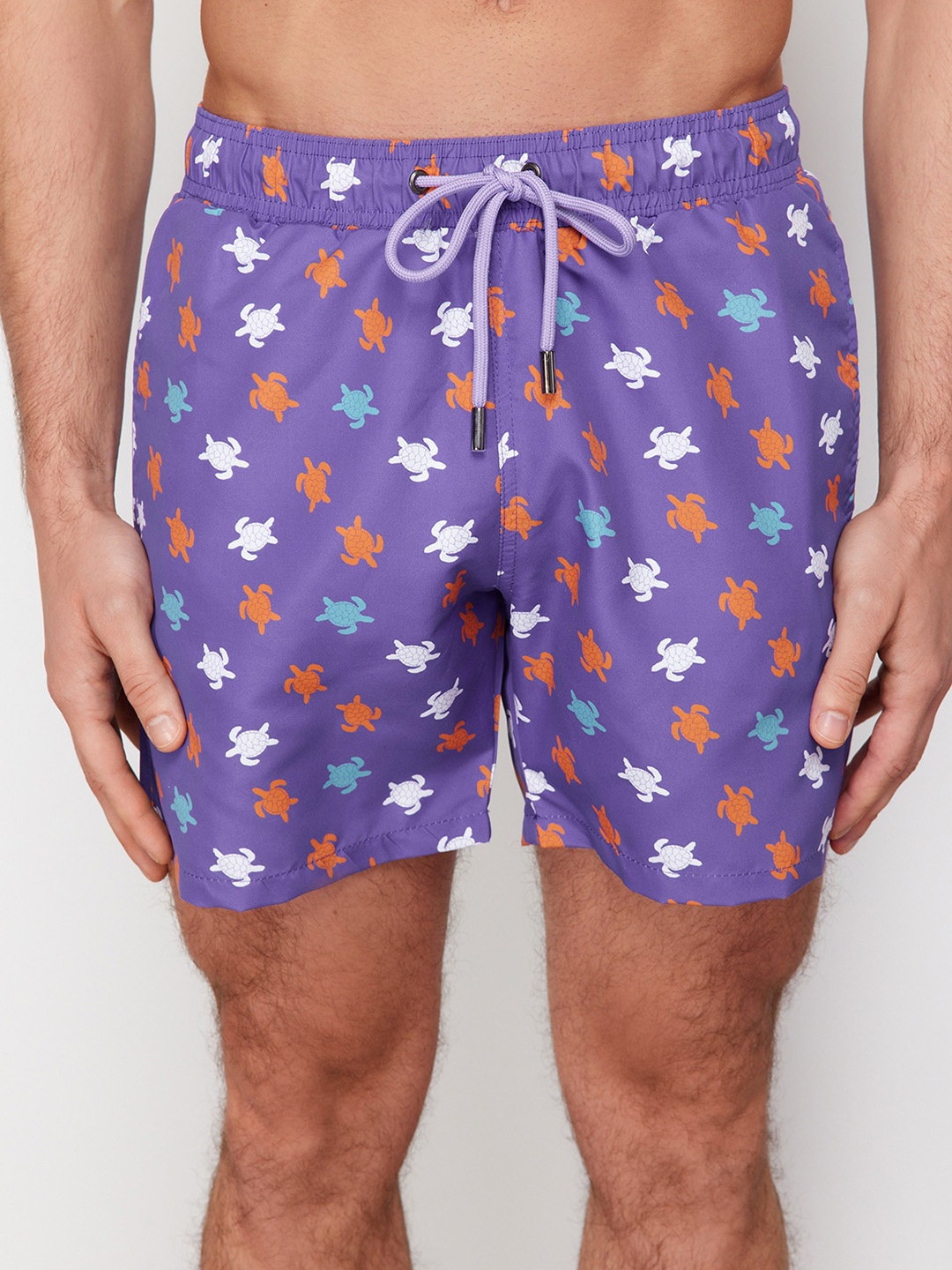 

Trendyol Men Conversational Printed Mid Rise Shorts, Purple