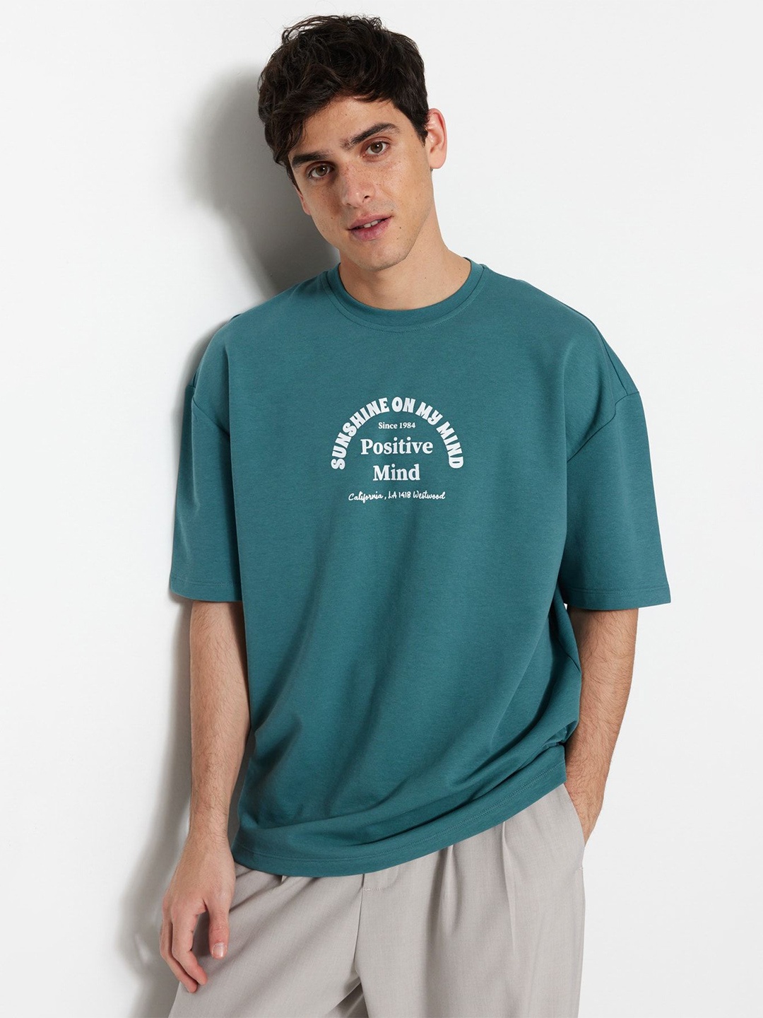 

Trendyol Men Typography Printed Round Neck T-shirt, Green