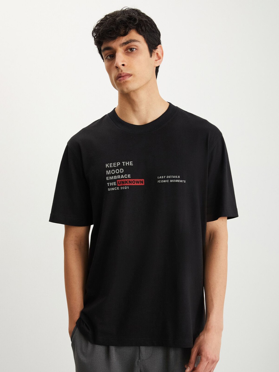 GRIMELANGE Men Typography Printed Round Neck T-shirt, Black