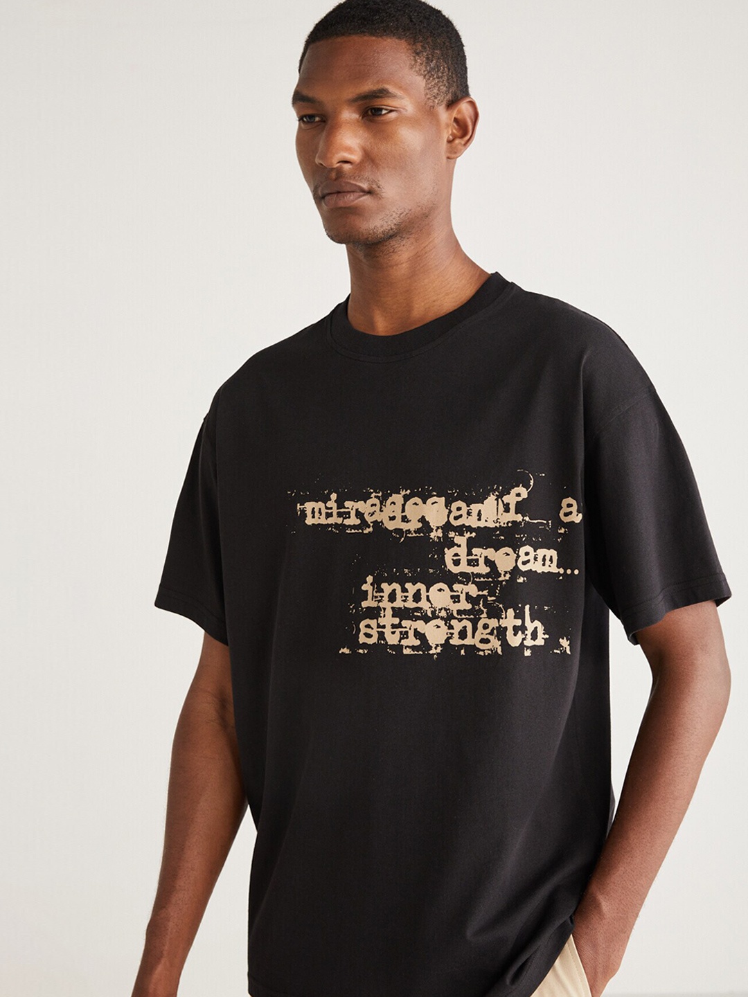 

GRIMELANGE Typography Printed Round Neck Cotton T-shirt, Black