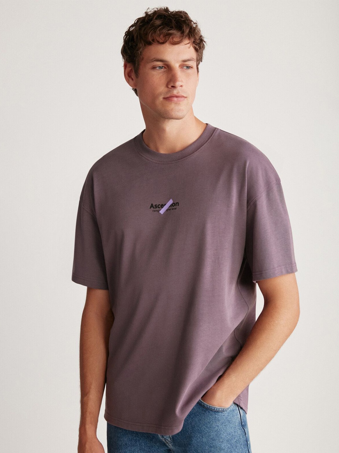 

GRIMELANGE Men Typography Printed Round Neck T-shirt, Purple