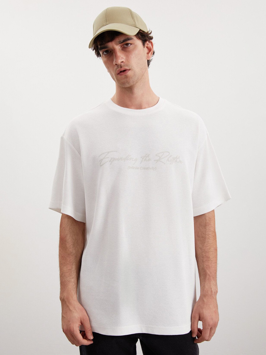 

GRIMELANGE Men Typography Printed Round Neck T-shirt, White