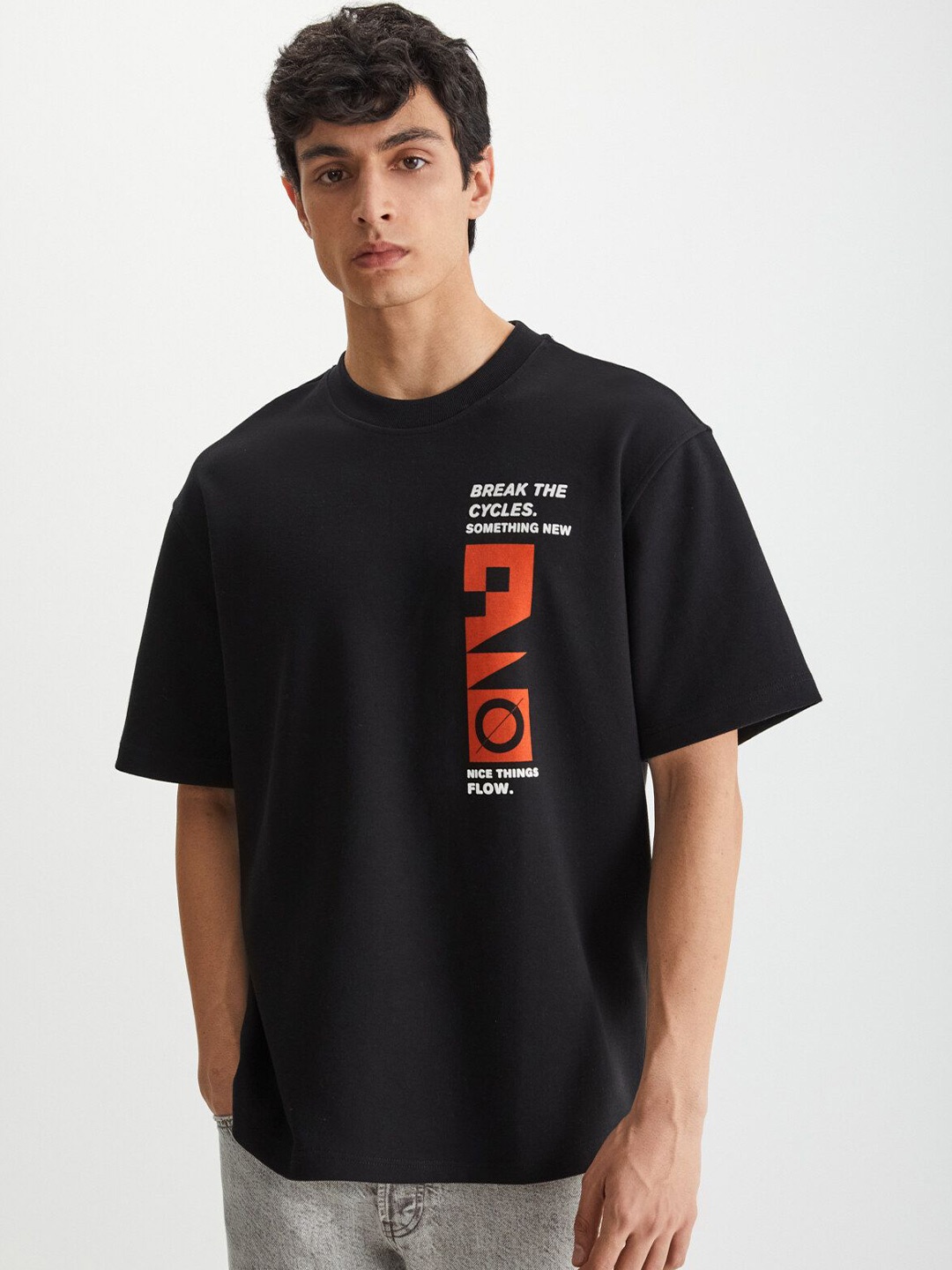 GRIMELANGE Men Typography Printed Round Neck T-shirt, Black