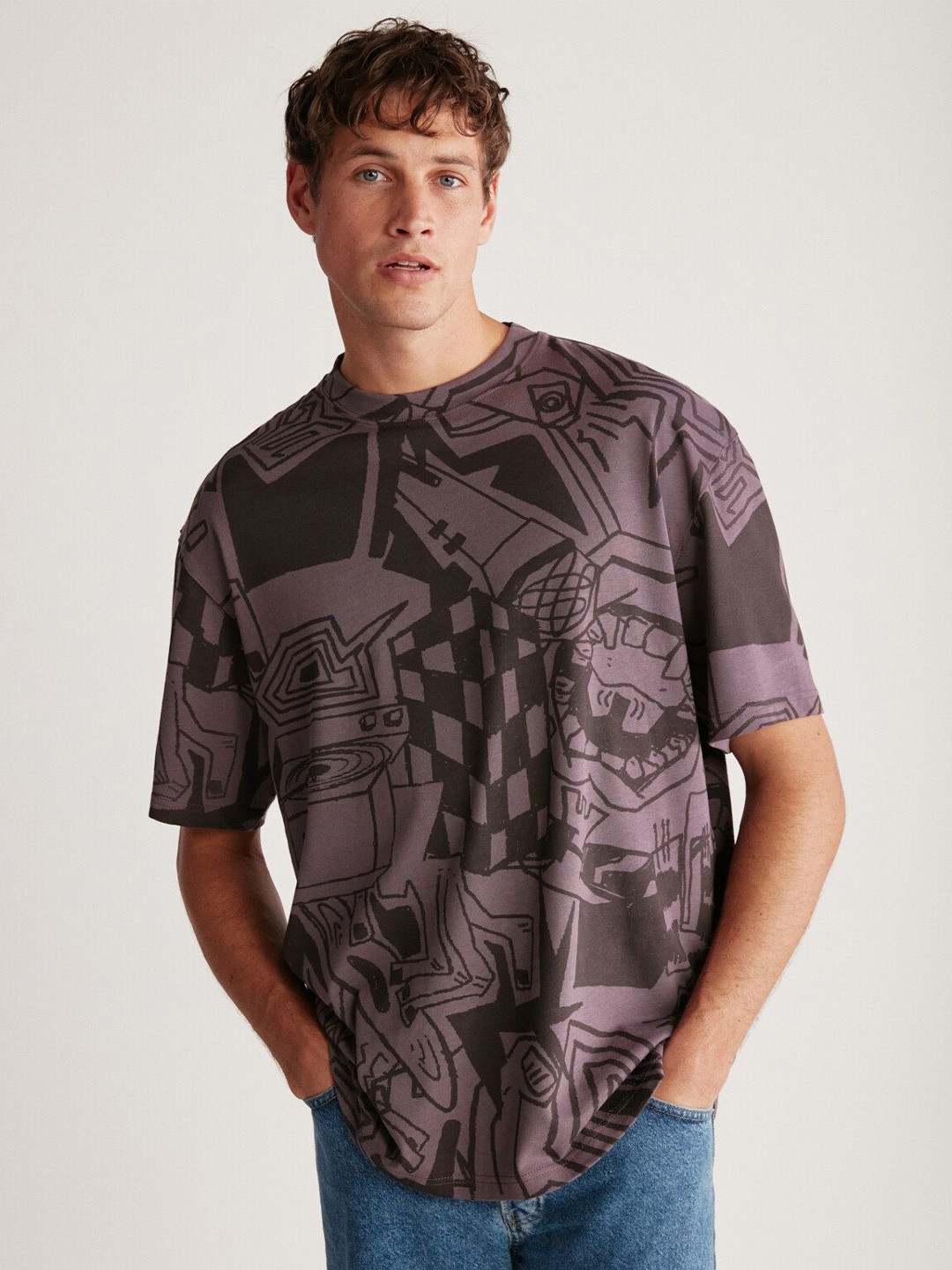 

GRIMELANGE Men Abstract Printed Round Neck T-shirt, Purple