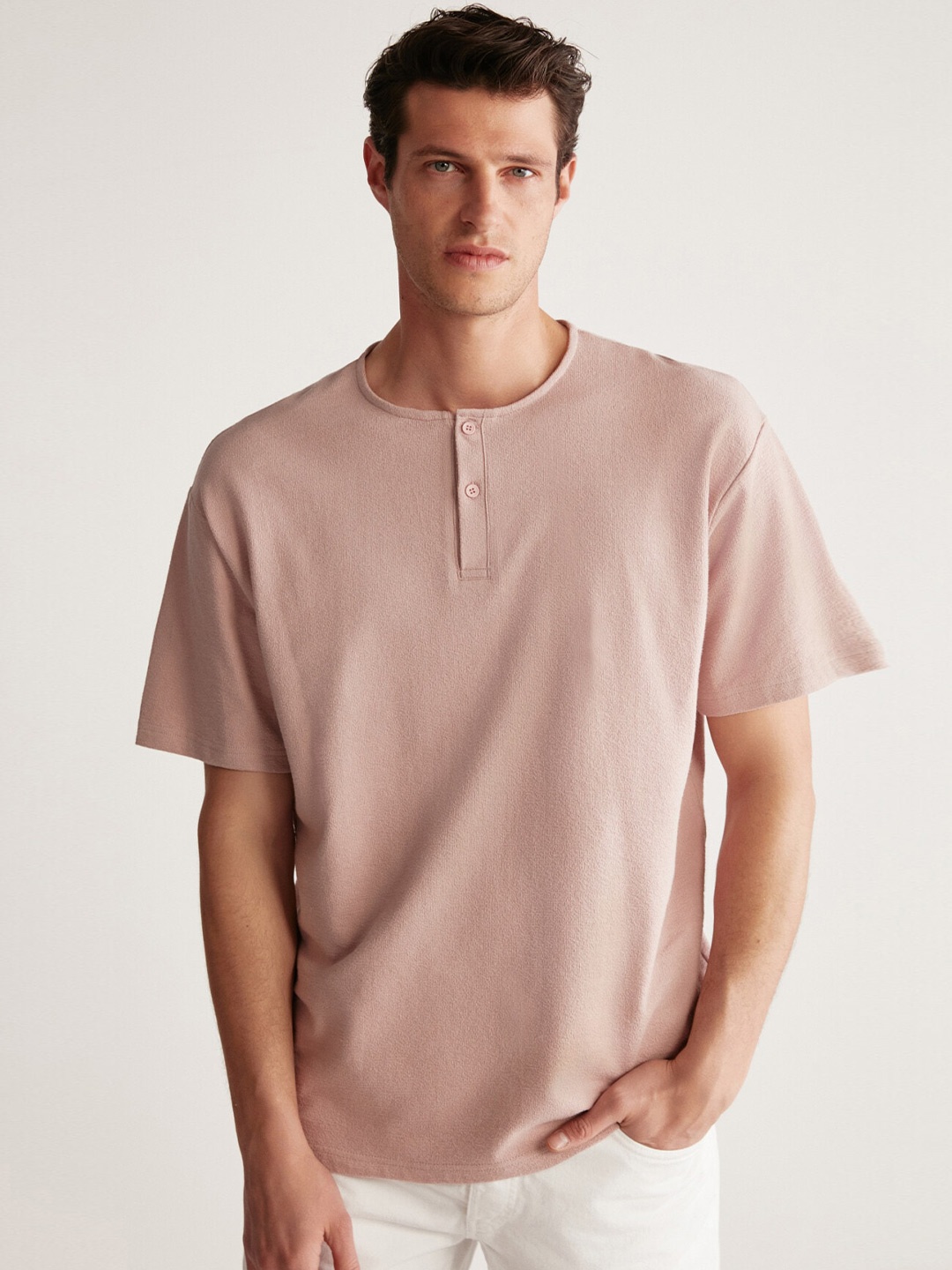 

GRIMELANGE Men Solid Round Neck T-shirt, Pink