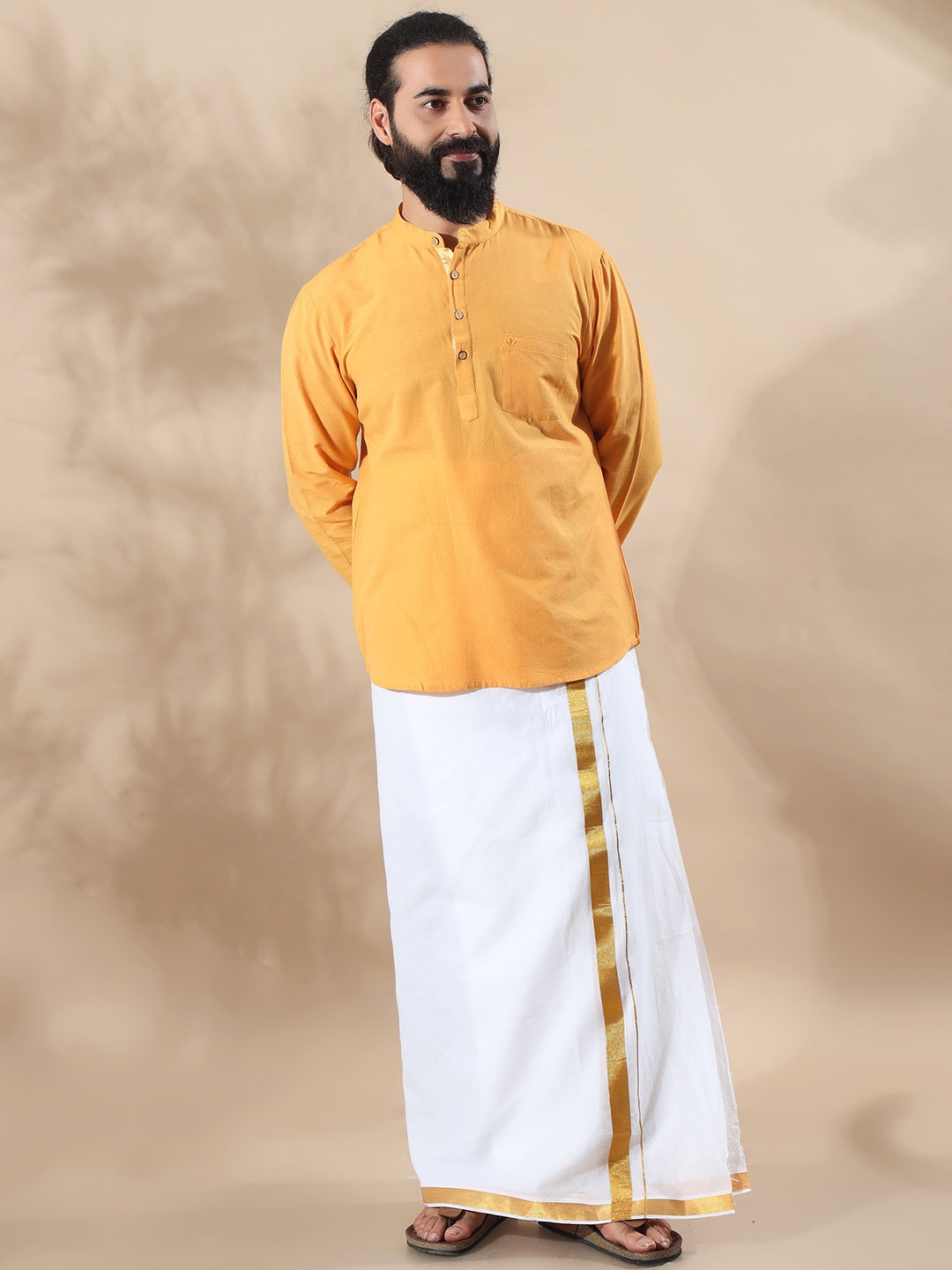 

FILORI Solid Cotton Blend Long Sleeves Short Kurta, Yellow