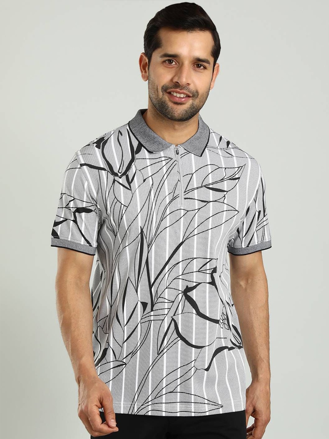 

Indian Terrain Men Tropical Printed Polo Collar Cotton T-shirt, Black