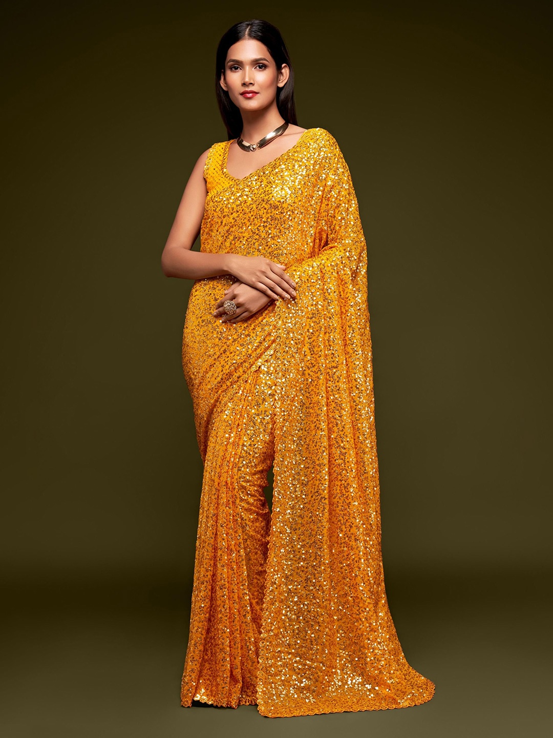 

Trendmalls Embellished embroidered Pure Georgette sarees, Orange